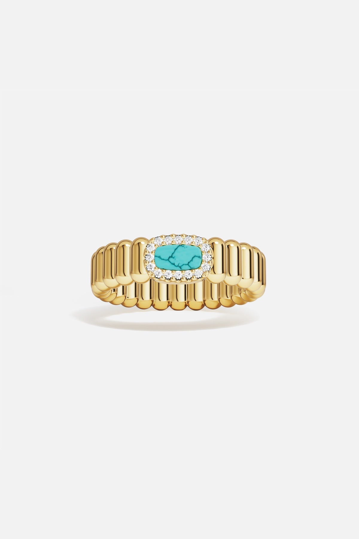 APM Ring in golden hue, a turquoise glow framed with quiet radiance.
