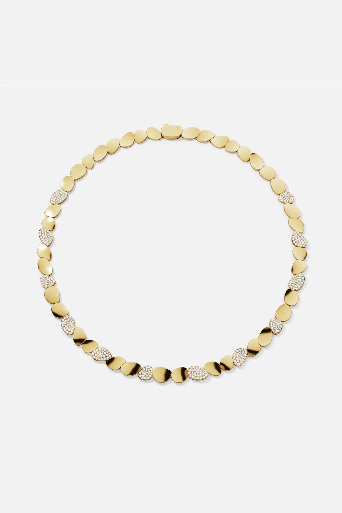 APM Necklace, golden pebbles shimmering with a soft, radiant glow.