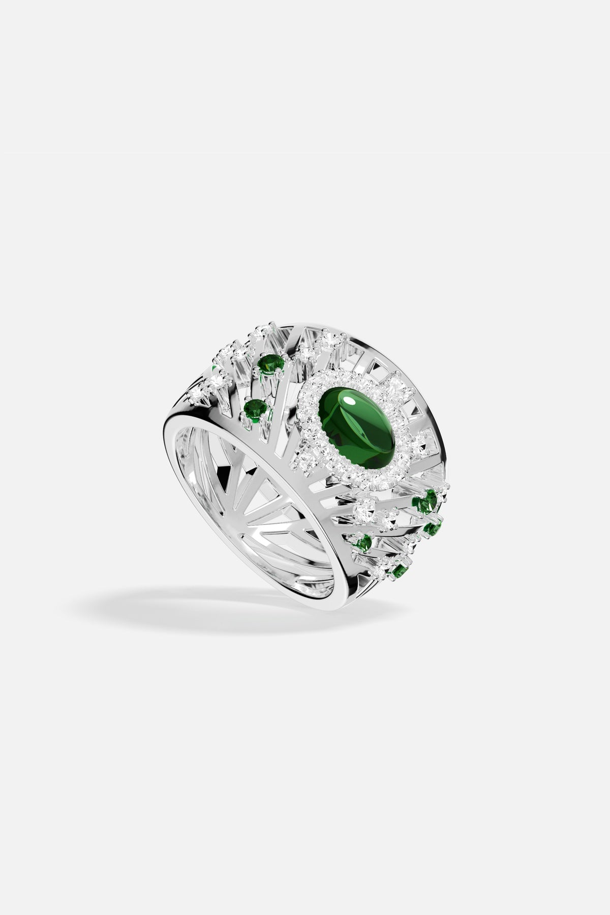 APM Monaco ring in rhodium finish, radiant green centerpiece, a bold statement of elegance.