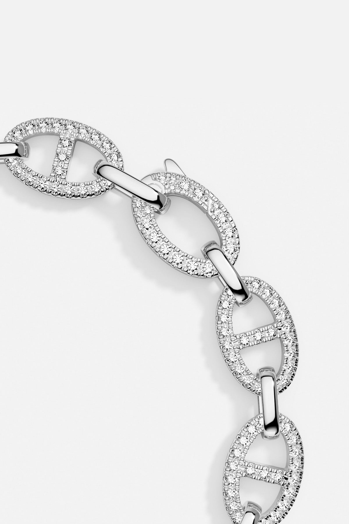 APM Monaco bracelet in rhodium finish, bold marine links shimmering with quiet confidence.