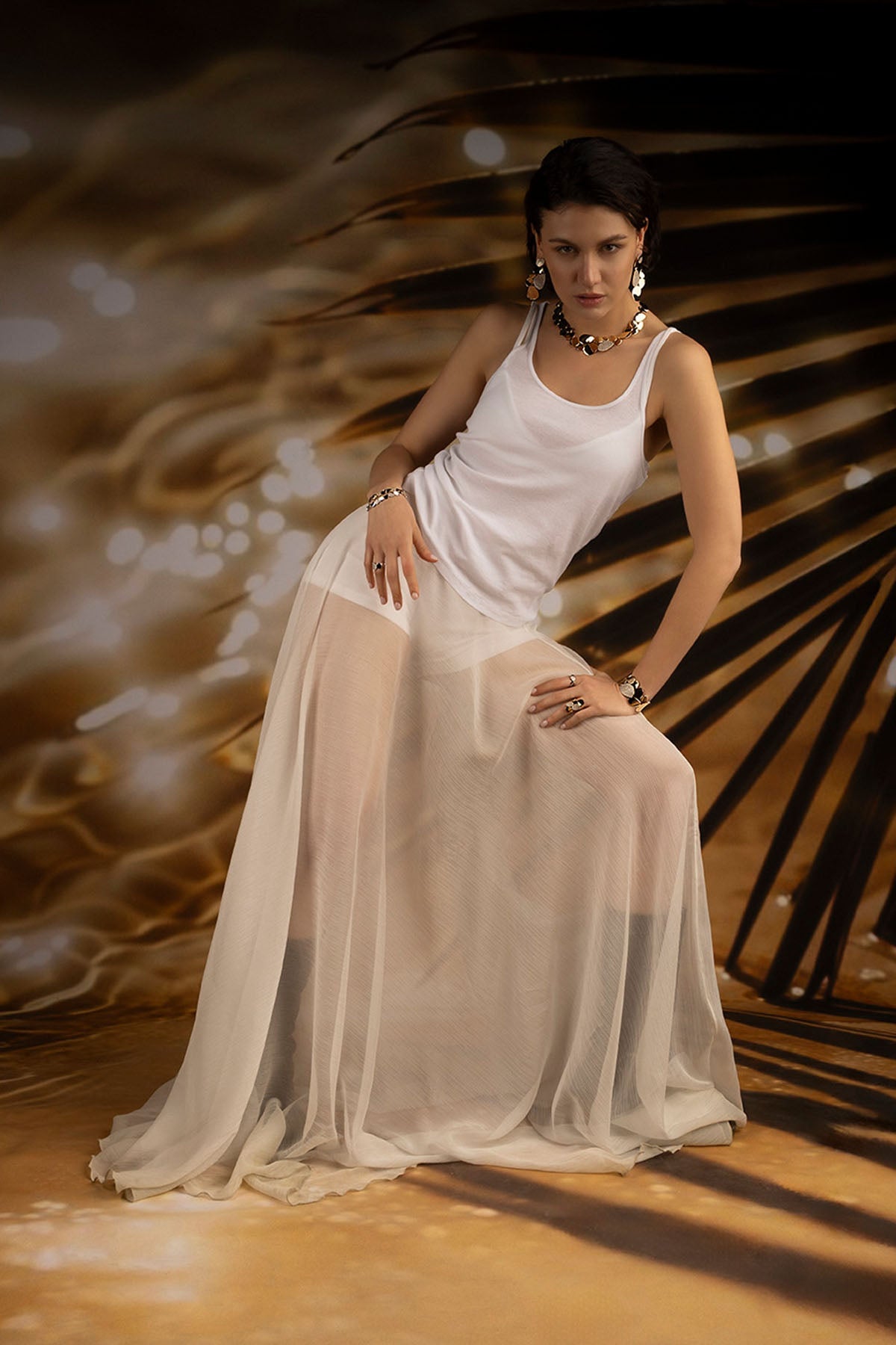 Bracelets APM Monaco fashion jewelry, dark-toned, pavé bead design.