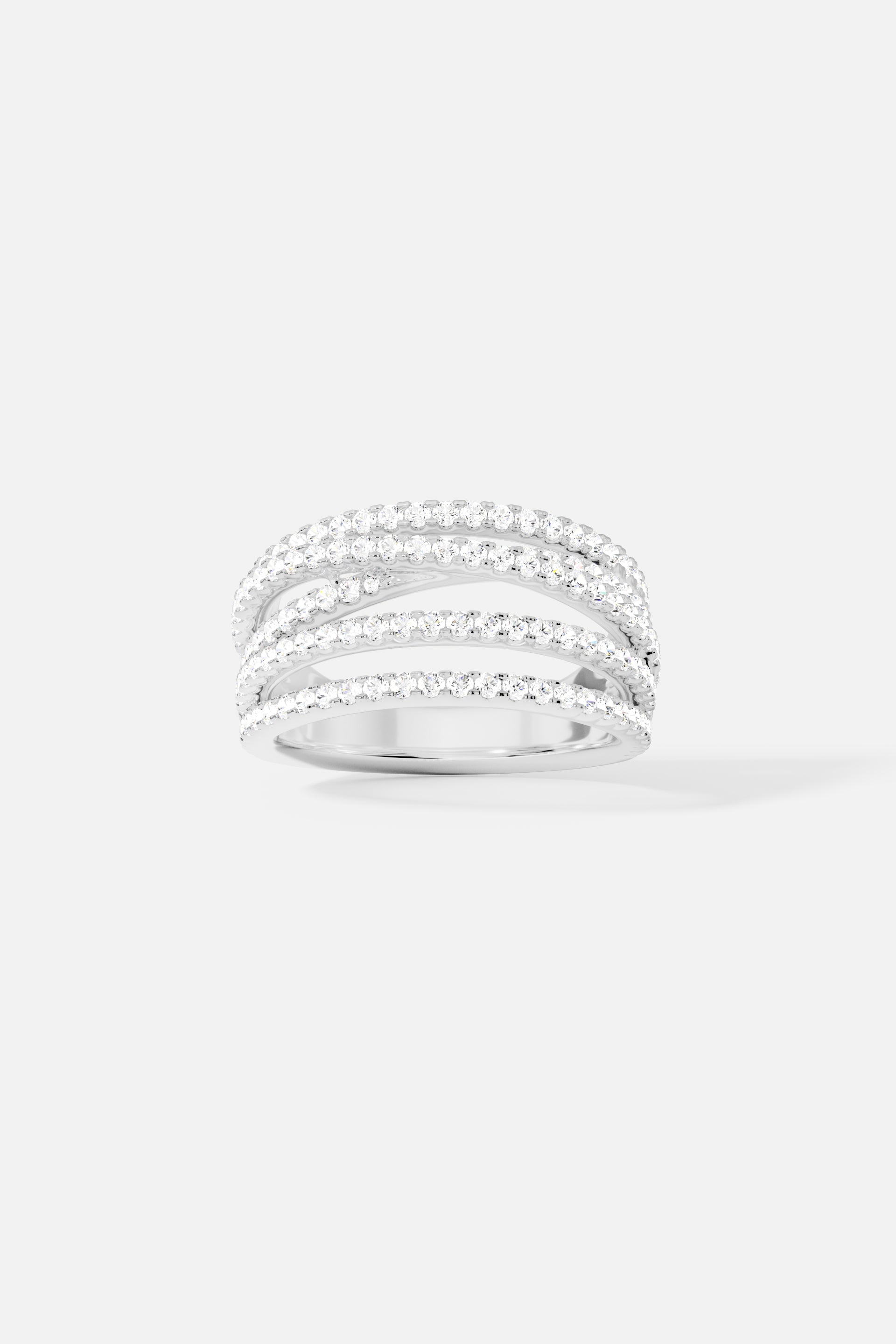 Rings APM Monaco, a silver-tone ring featuring five interlocking pavé bands set with clear stones.
