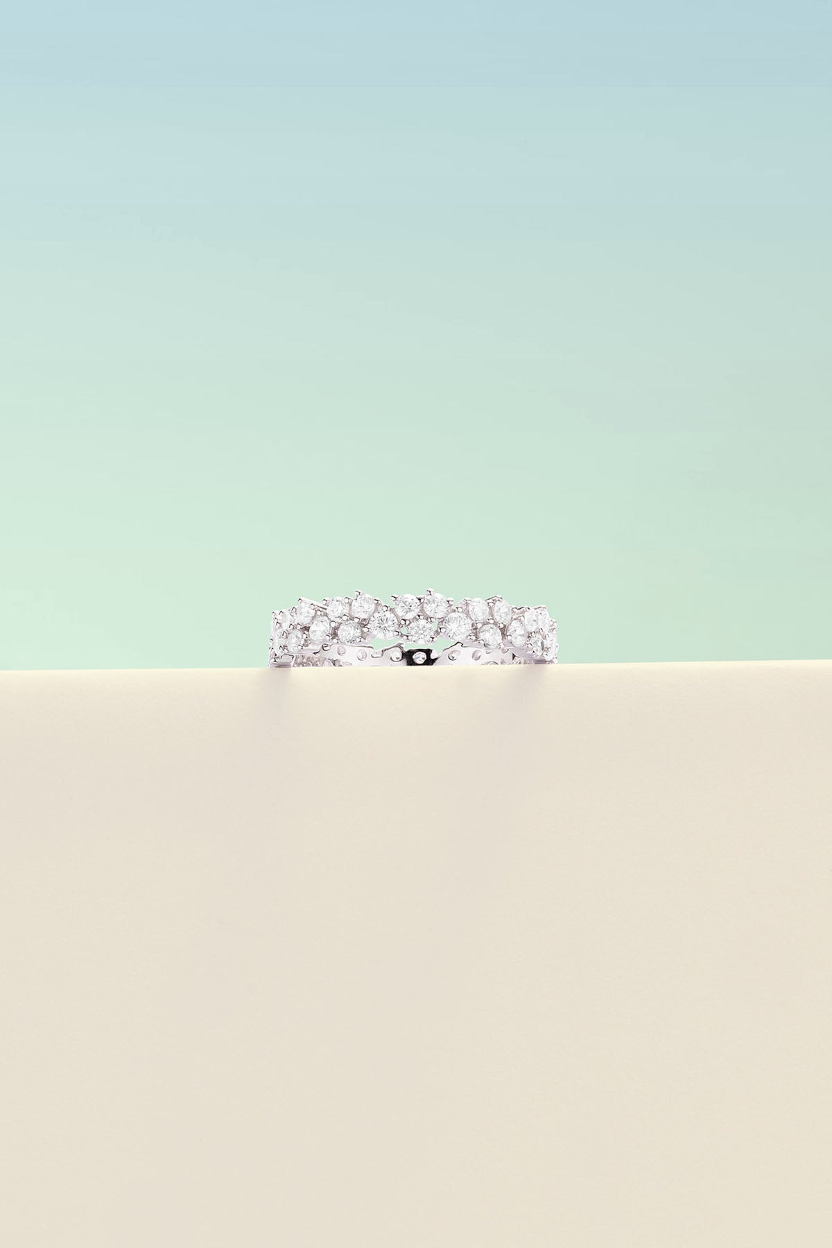 Rings APM Monaco: white gold pavé ring with multiple small diamonds.