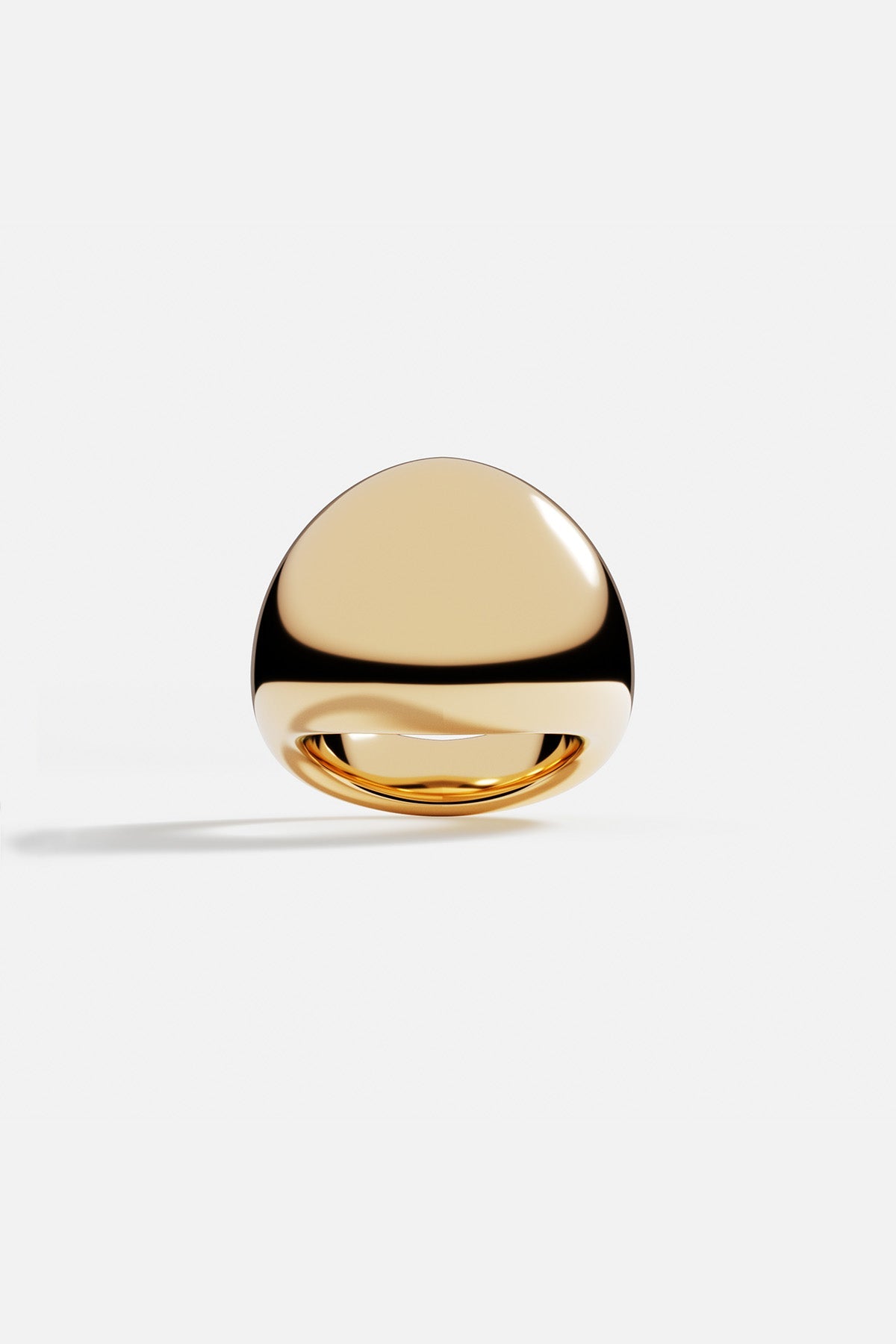 Rings APM Monaco yellow gold dome ring with a rounded top.