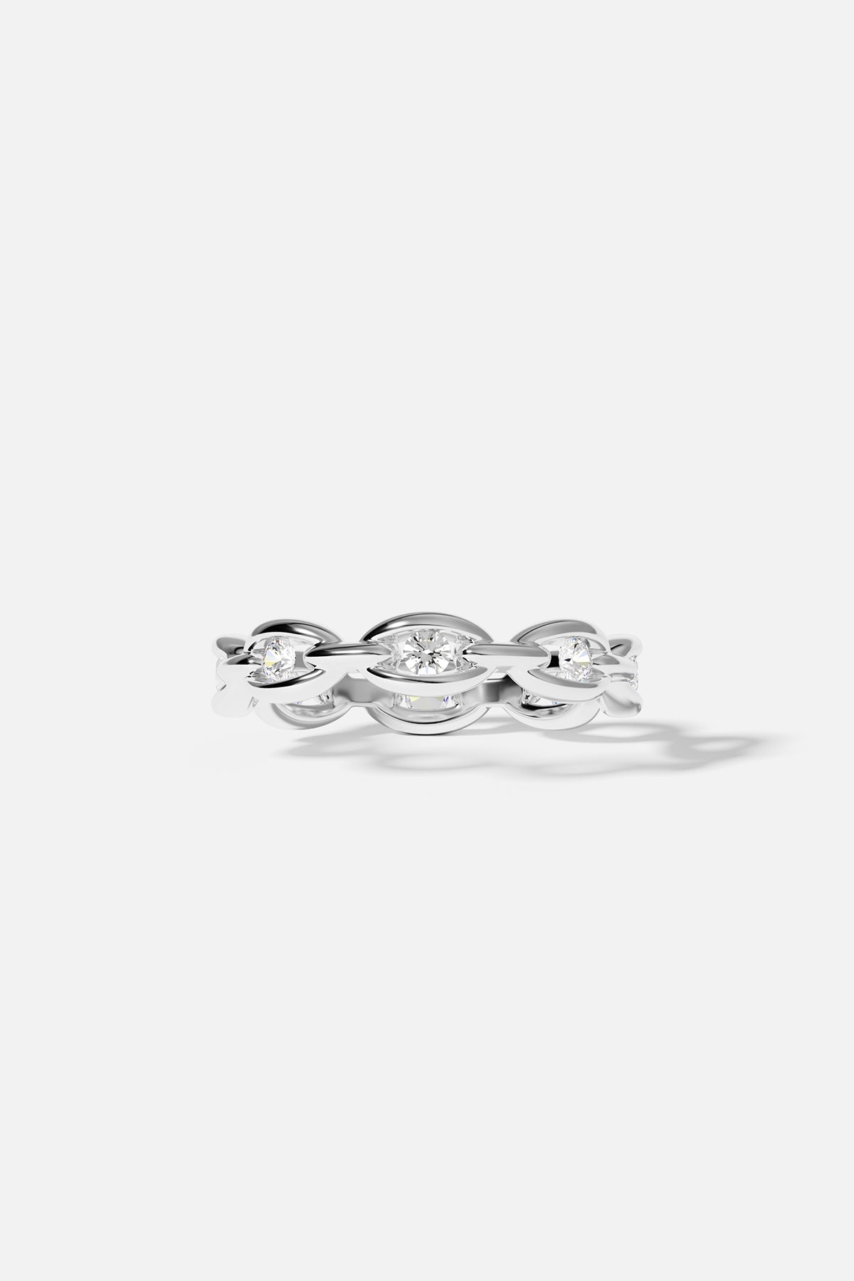 Rings APM Monaco, pavé chain ring in white metal with three linked white diamonds.