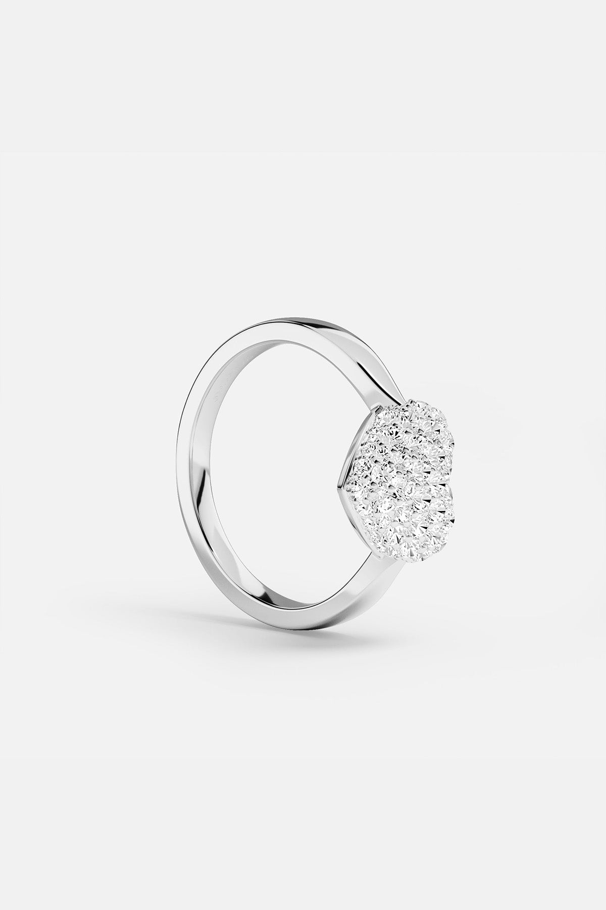 APM MONACO silver ring with a heart-shaped stones on a white background