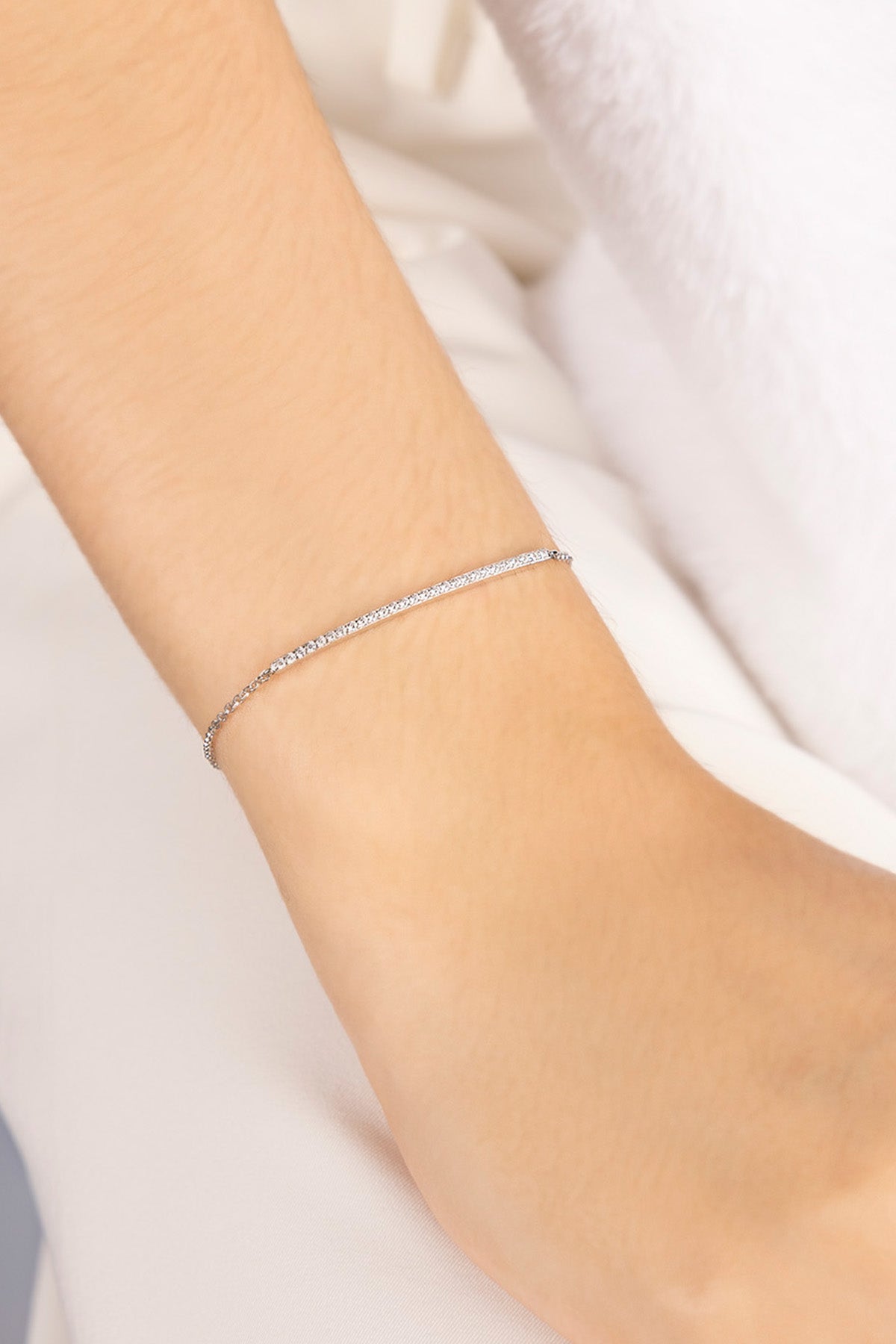 APM MONACO adjustable bracelet with paved line design in silver