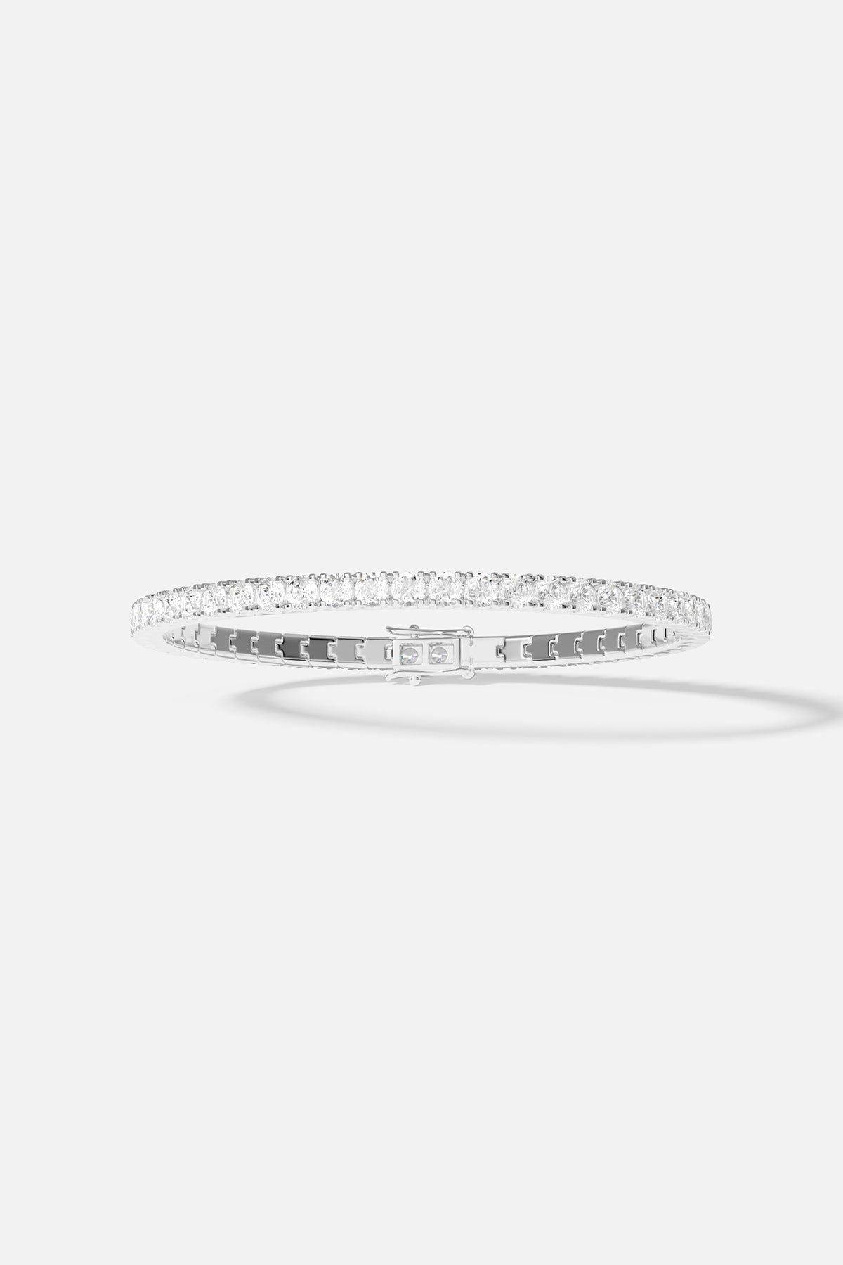 Bracelets APM Monaco pavé bangle in silver with round clear stones.