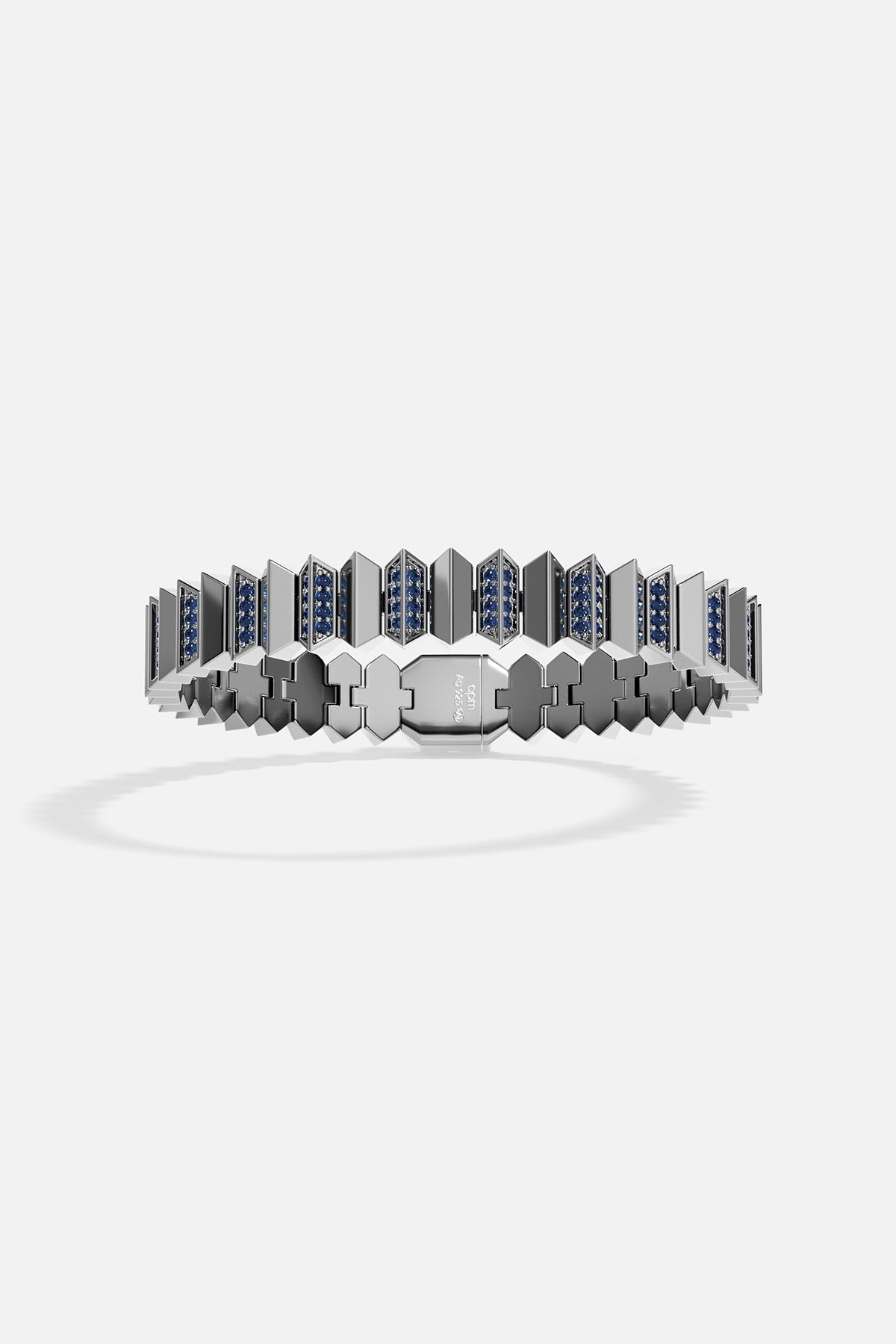 Bracelet with geometric design and blue stones on a white background