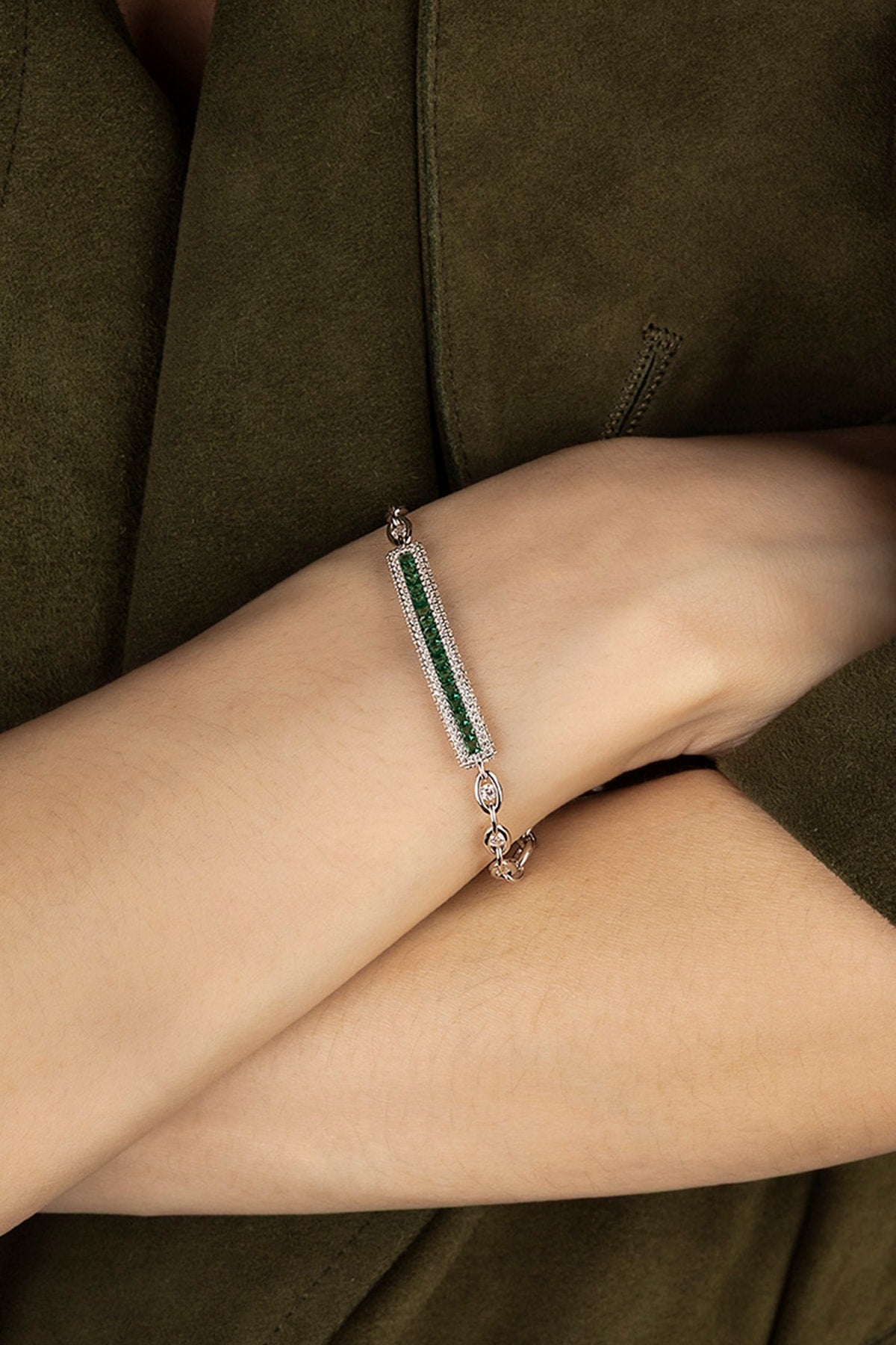 Close-up of a silver bracelet on a person's wrist
