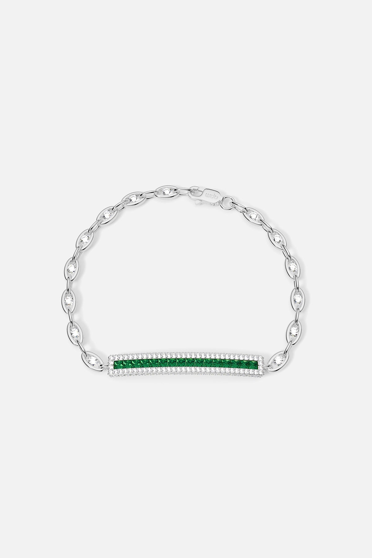 Silver bracelet with green stones on a white background