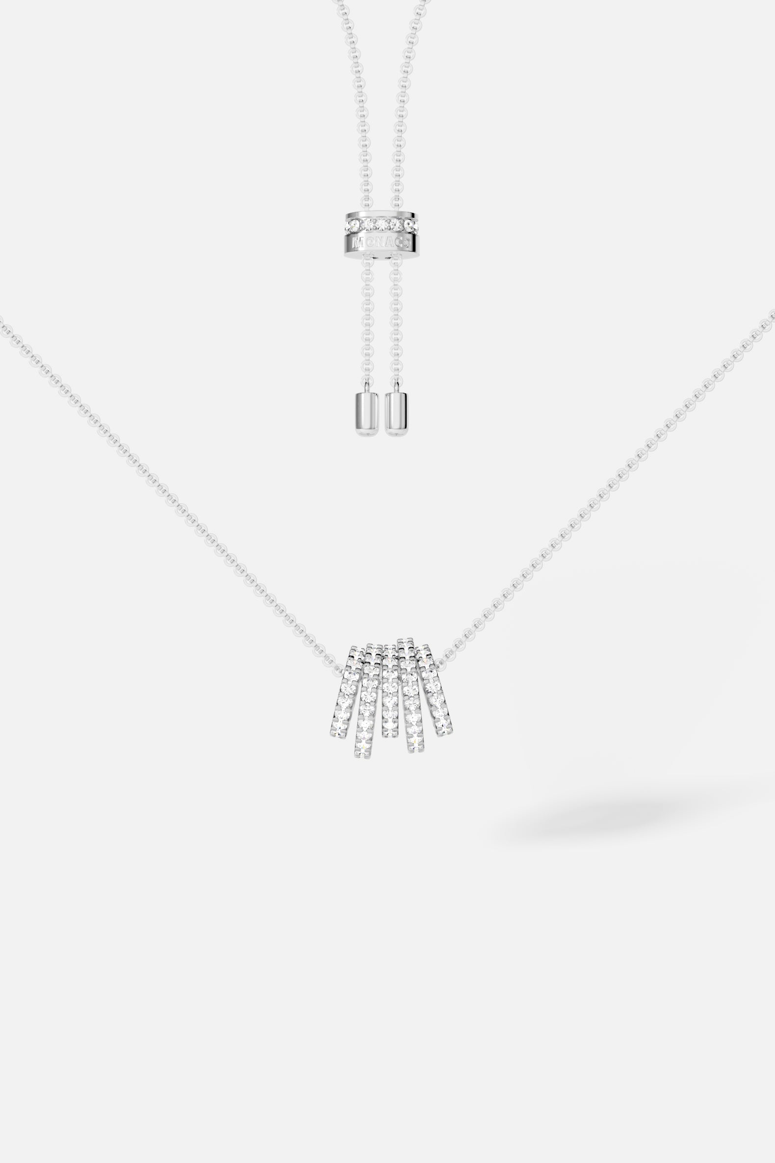 Necklaces APM Monaco white pavé diamond necklace with vertical ring pendants on a silver-tone chain; adjustable length.