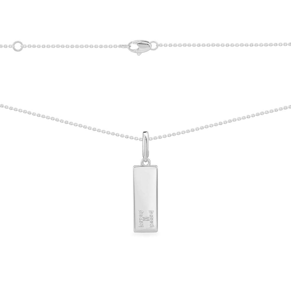 Necklaces APM Monaco: white-toned chain with a vertical rectangular pavé-encrusted H pendant.