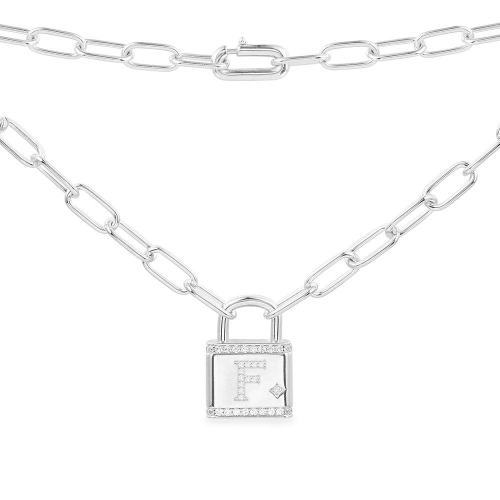 Necklaces APM Monaco: white gold chain with a lock charm bearing the initial F.