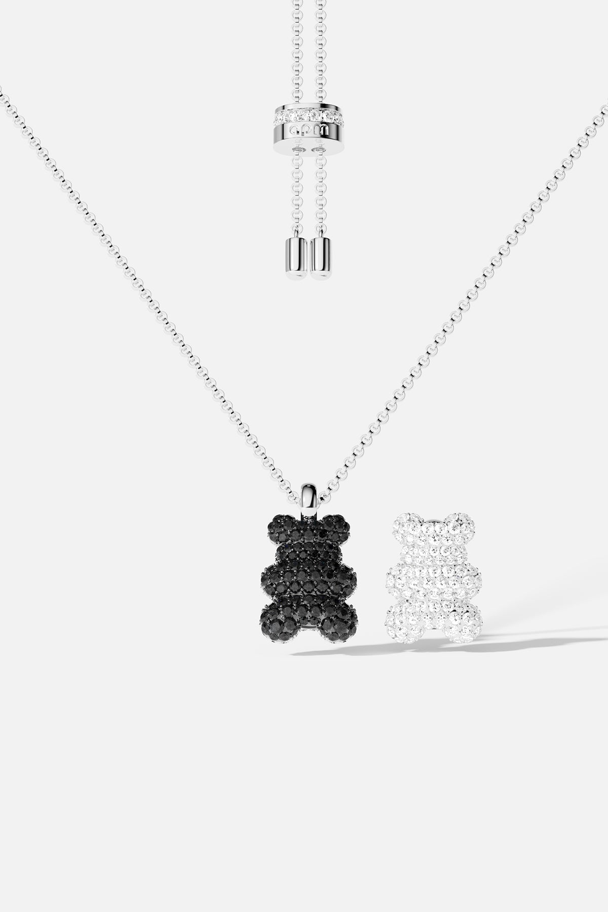 Necklaces APM Monaco – silver beaded adjustable necklace with two bear-shaped pendants, one black and one silver.