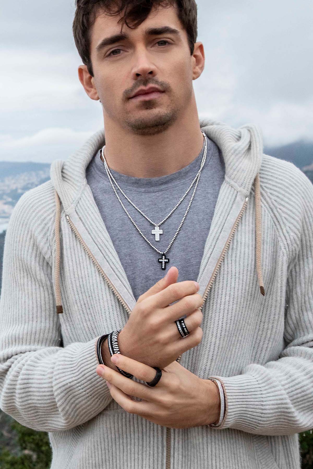 Necklaces APM Monaco: black pavé cross pendant, adjustable chain with beads.