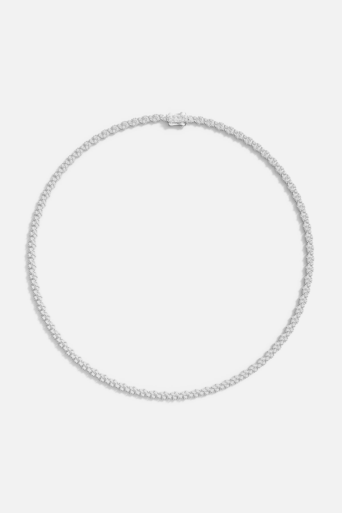 Necklaces APM Monaco pavé choker with small white stones on a silver-tone chain.