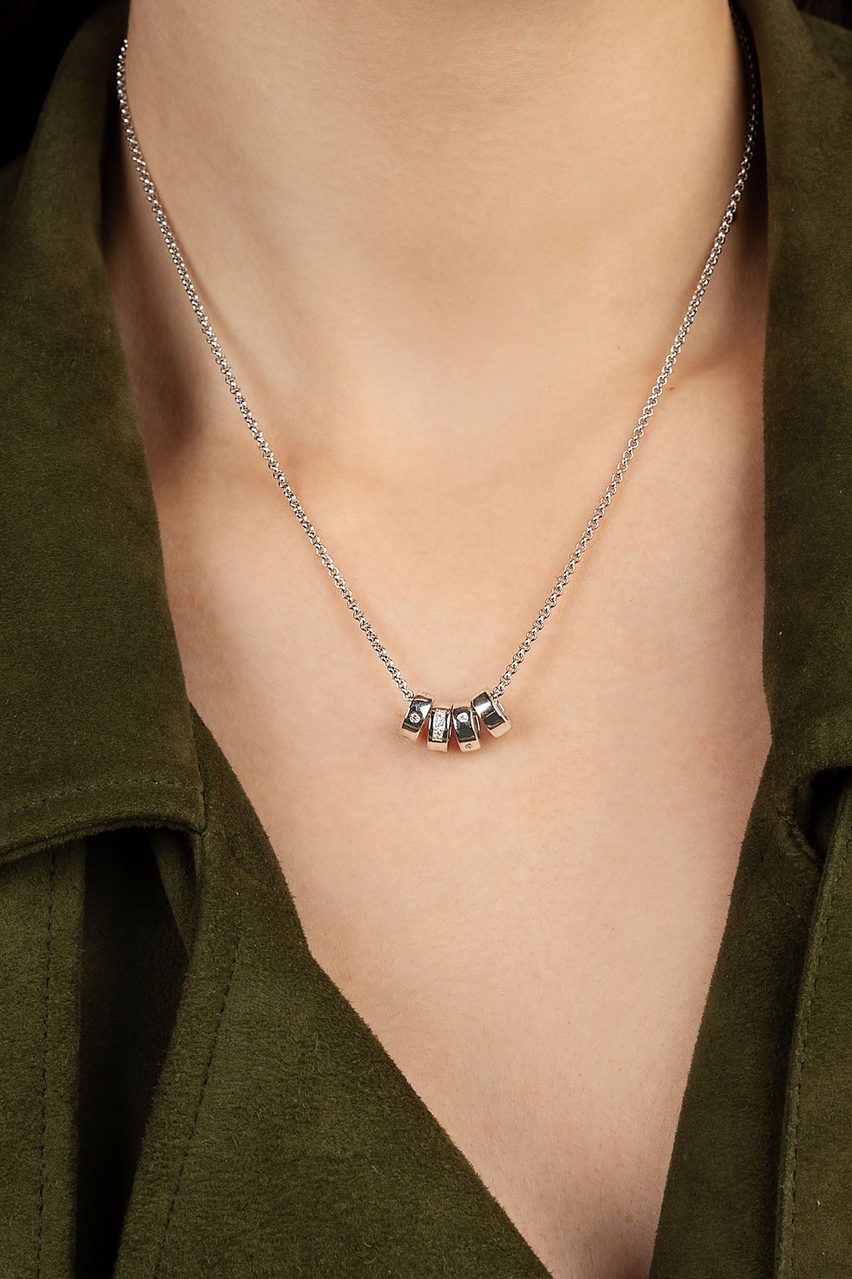 APM MONACO lover morse code Necklace worn by a person