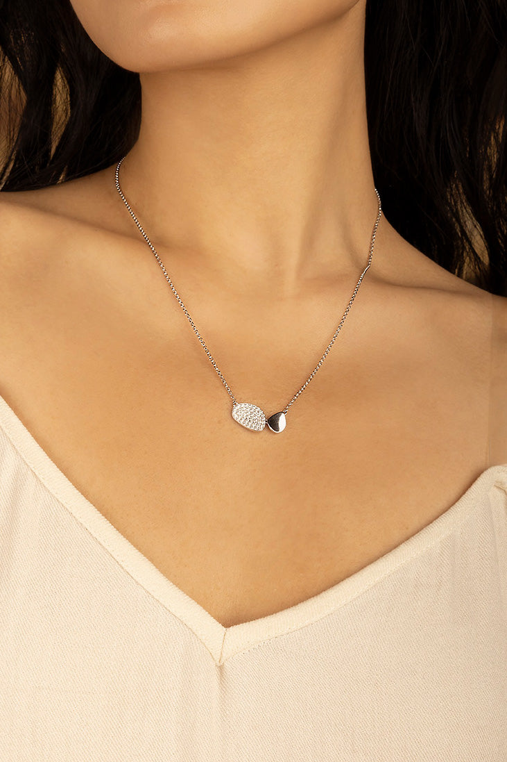 Necklaces APM Monaco yellow gold adjustable necklace with a pave-diamond leaf pendant.