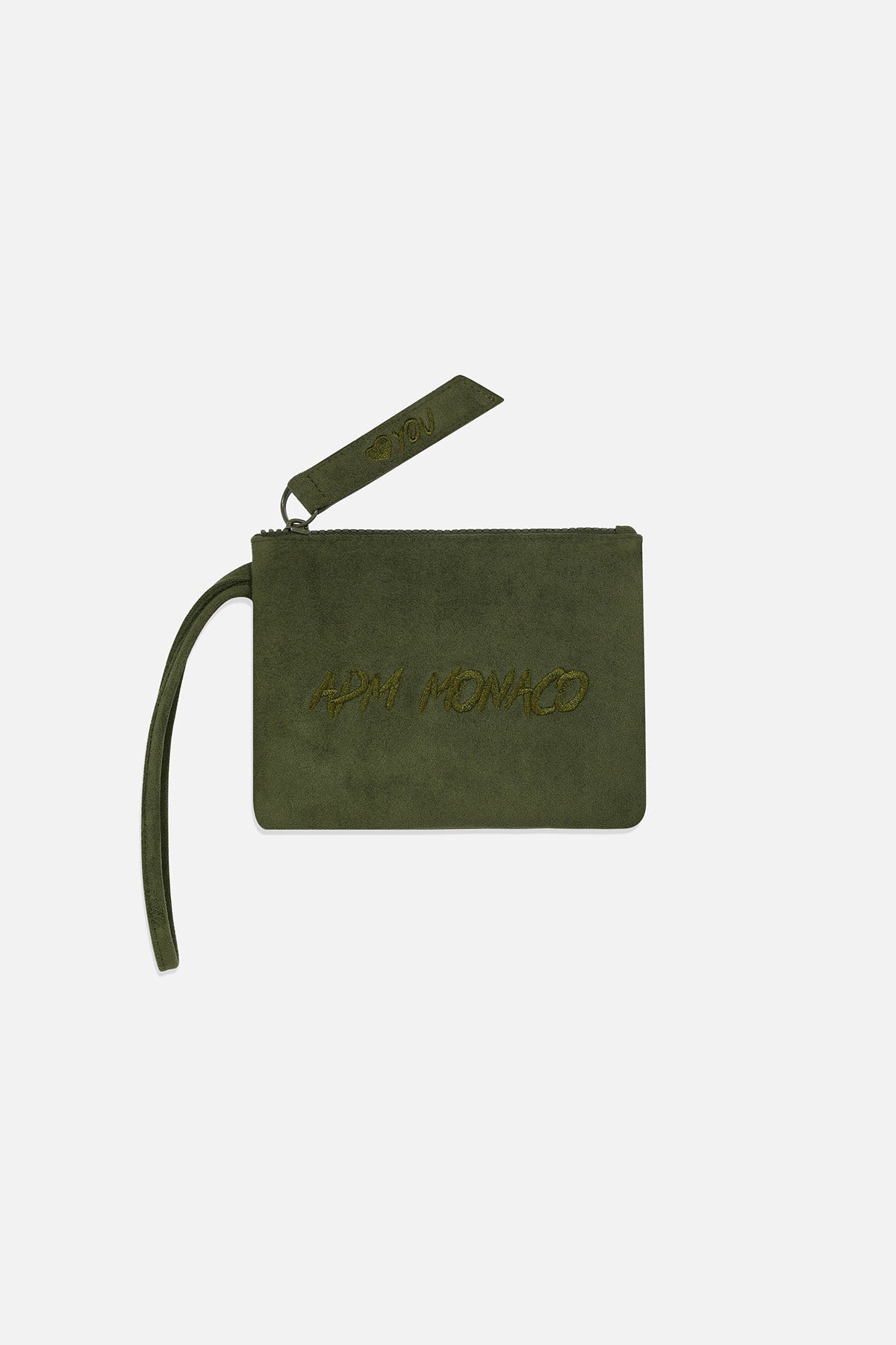 Green suede pouch on a light grey background