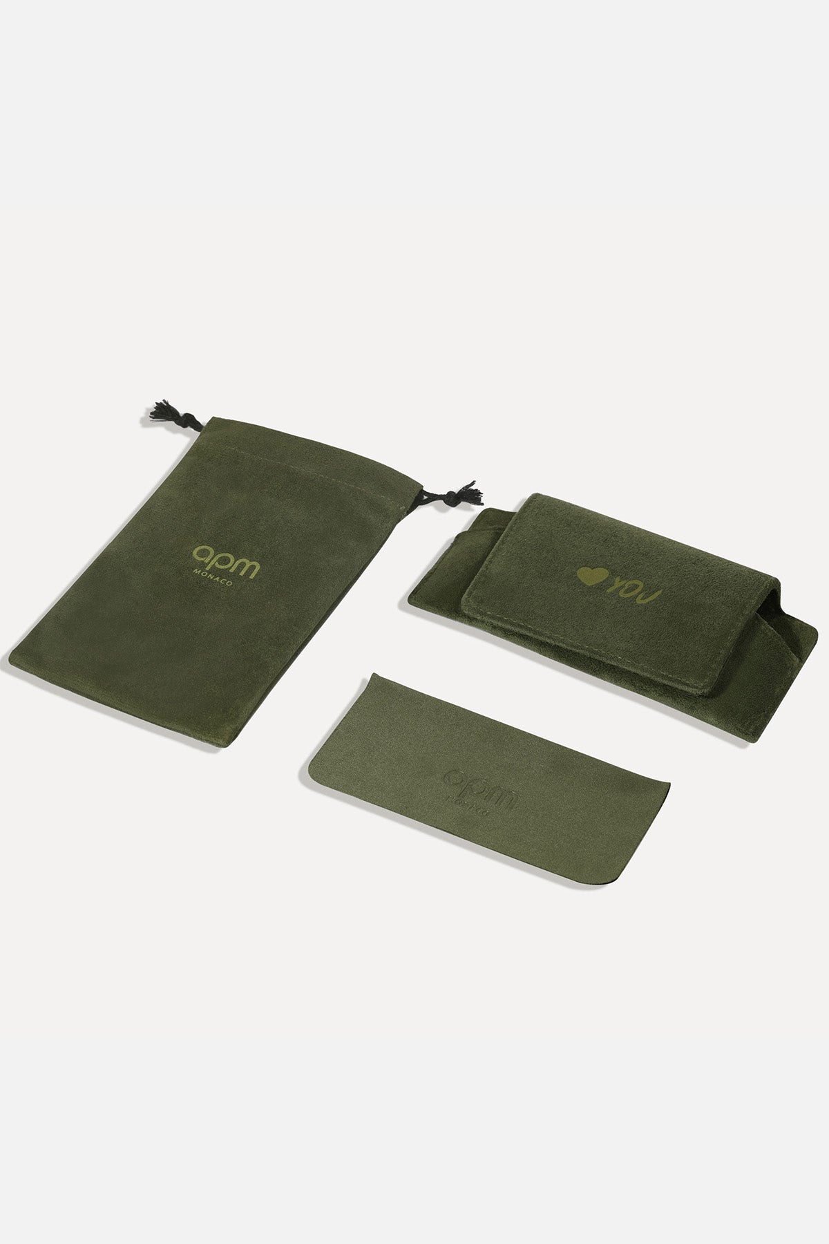 Set of green sunglasses pouches with 'qpm' branding on a light grey background