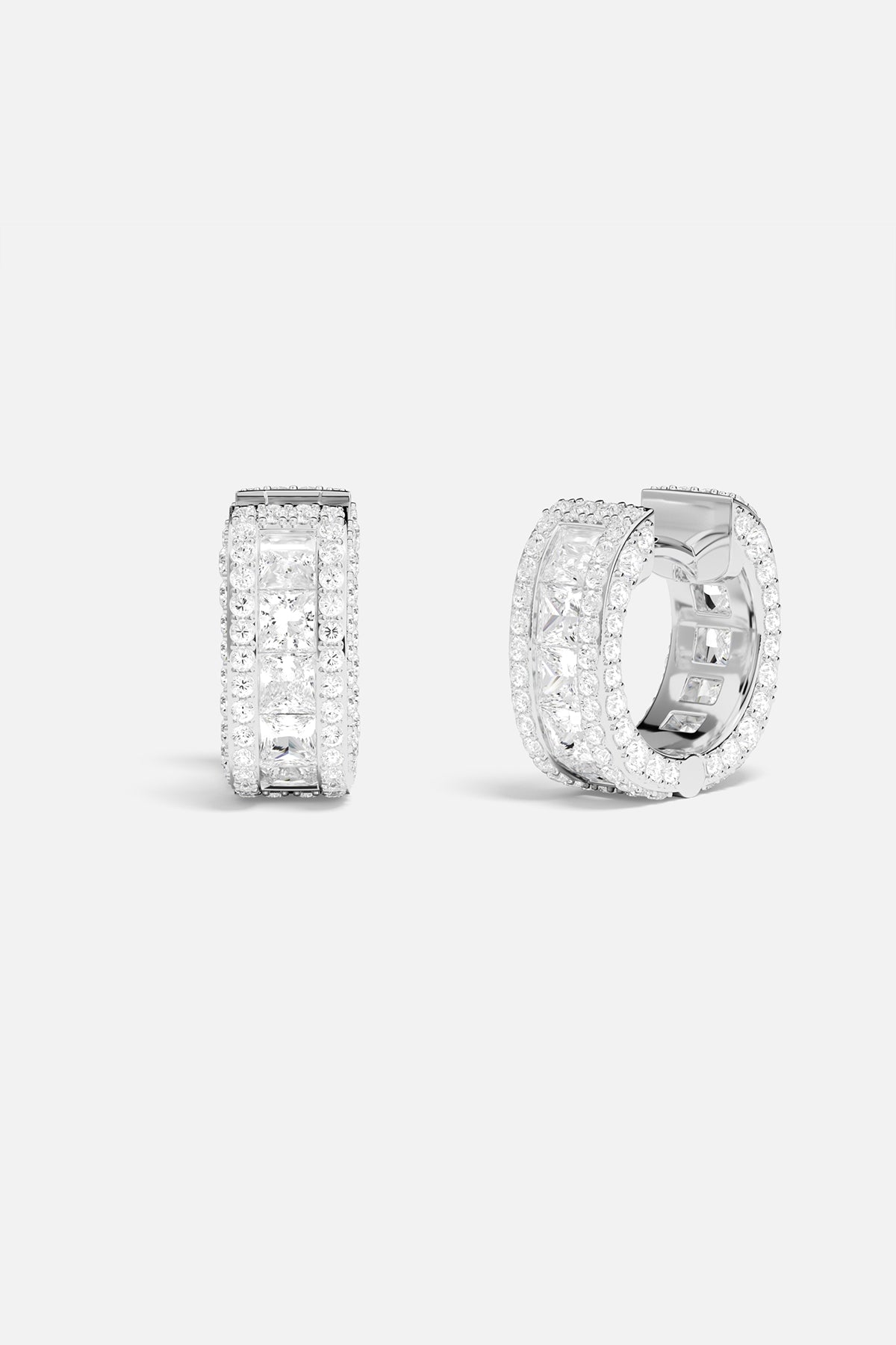 Earrings APM Monaco mini pavé hoop earrings in white, featuring pavé crystals on slender hoops.