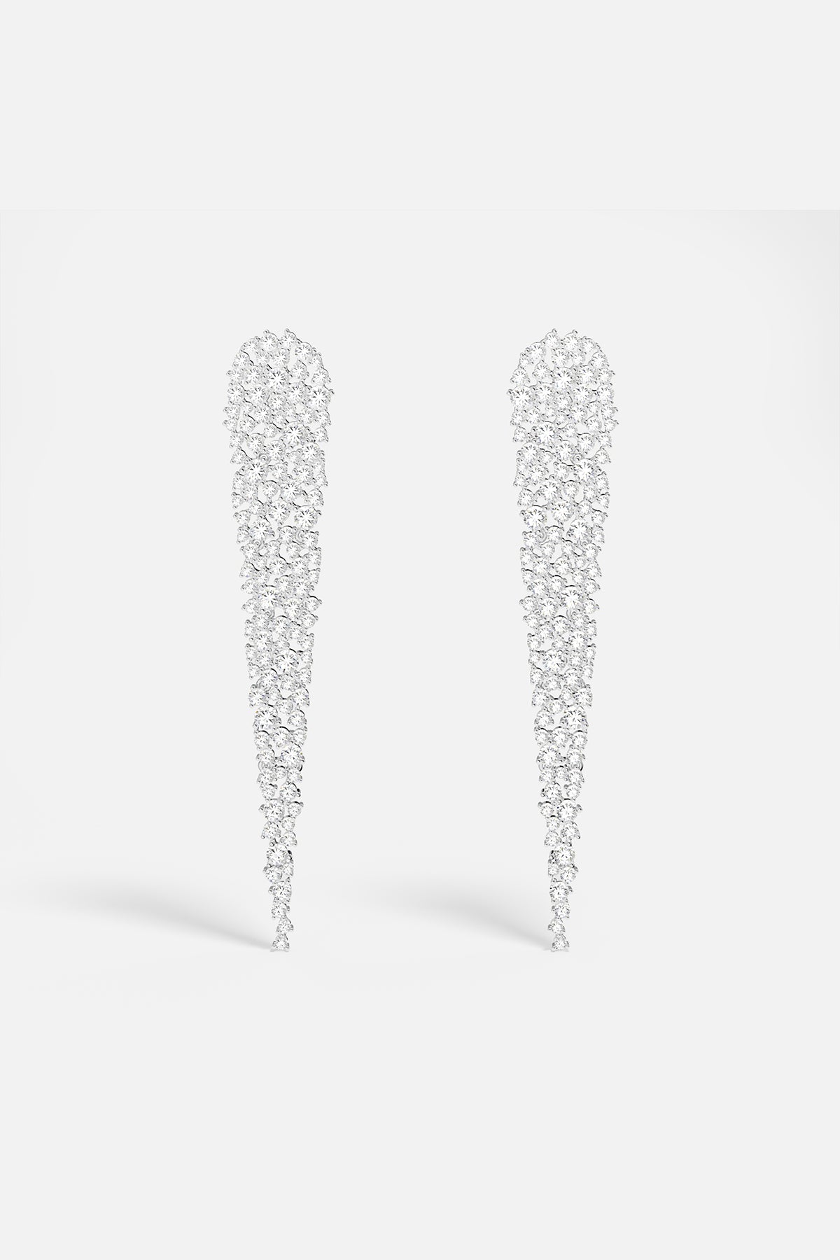 Earrings APM Monaco, white statement drop earrings with pavé clear gems.