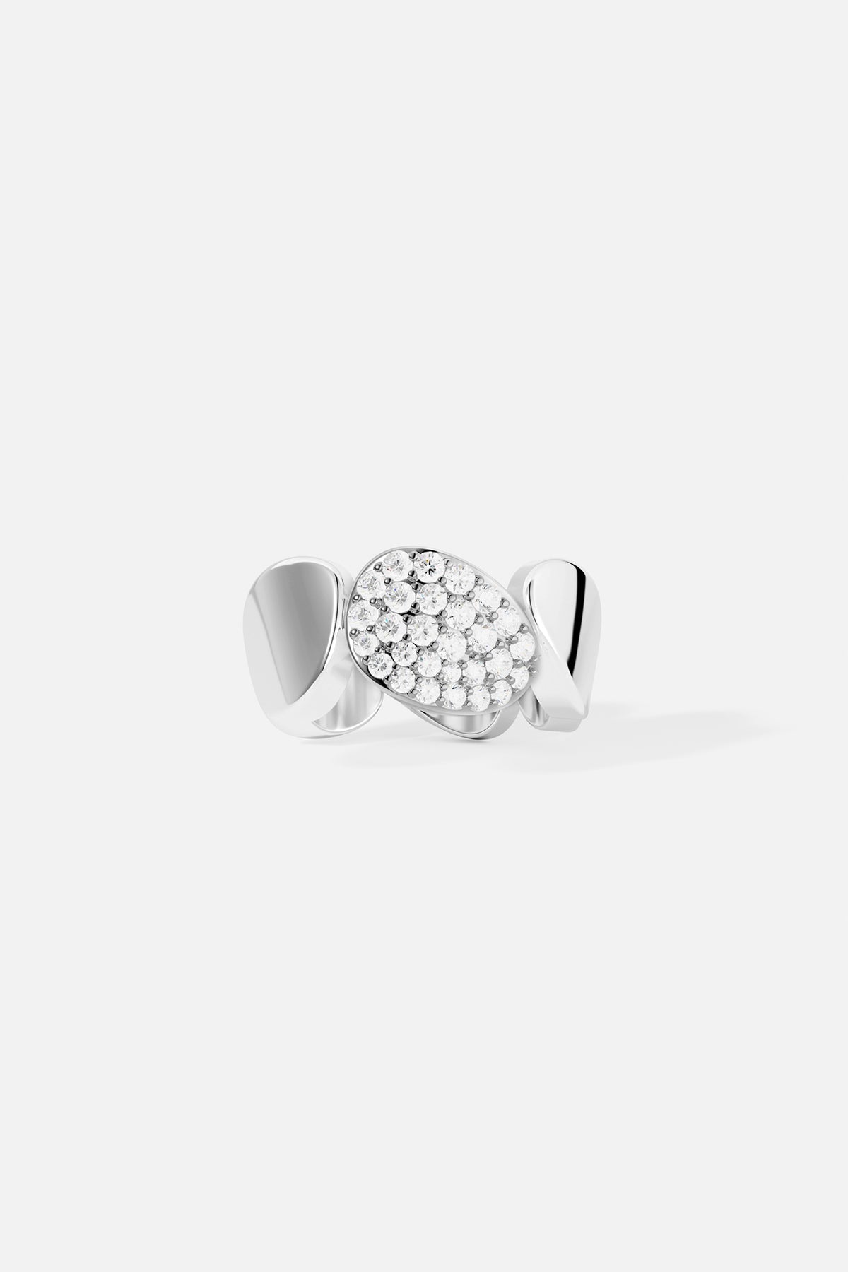 Earrings APM Monaco ear cuff in white silver-tone metal with an abstract pavé design and numerous white stones.