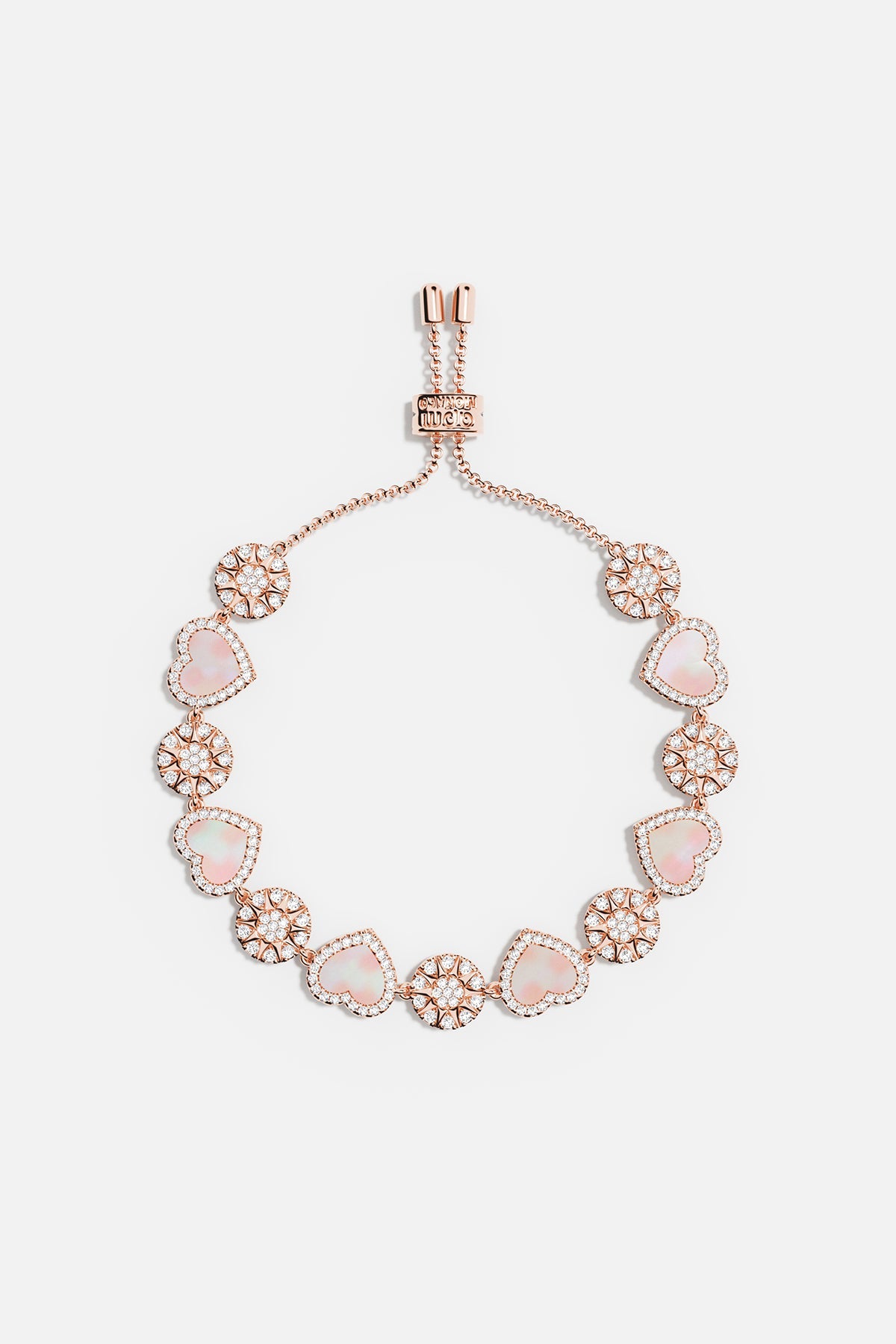 Bracelets APM Monaco, rose gold slider bracelet with pink nacre heart and dot accents, adjustable design.