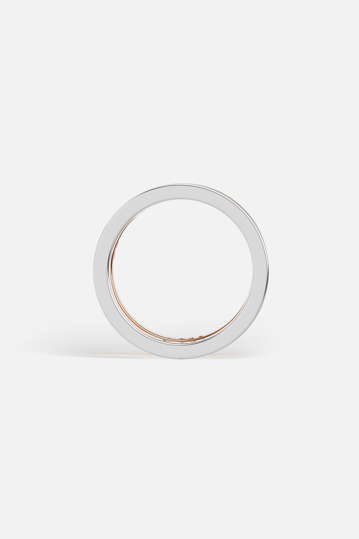 Rings APM Monaco: three stacked rings in white metal with MOI, rose gold with TOI, and yellow gold with white cubic zirconia.