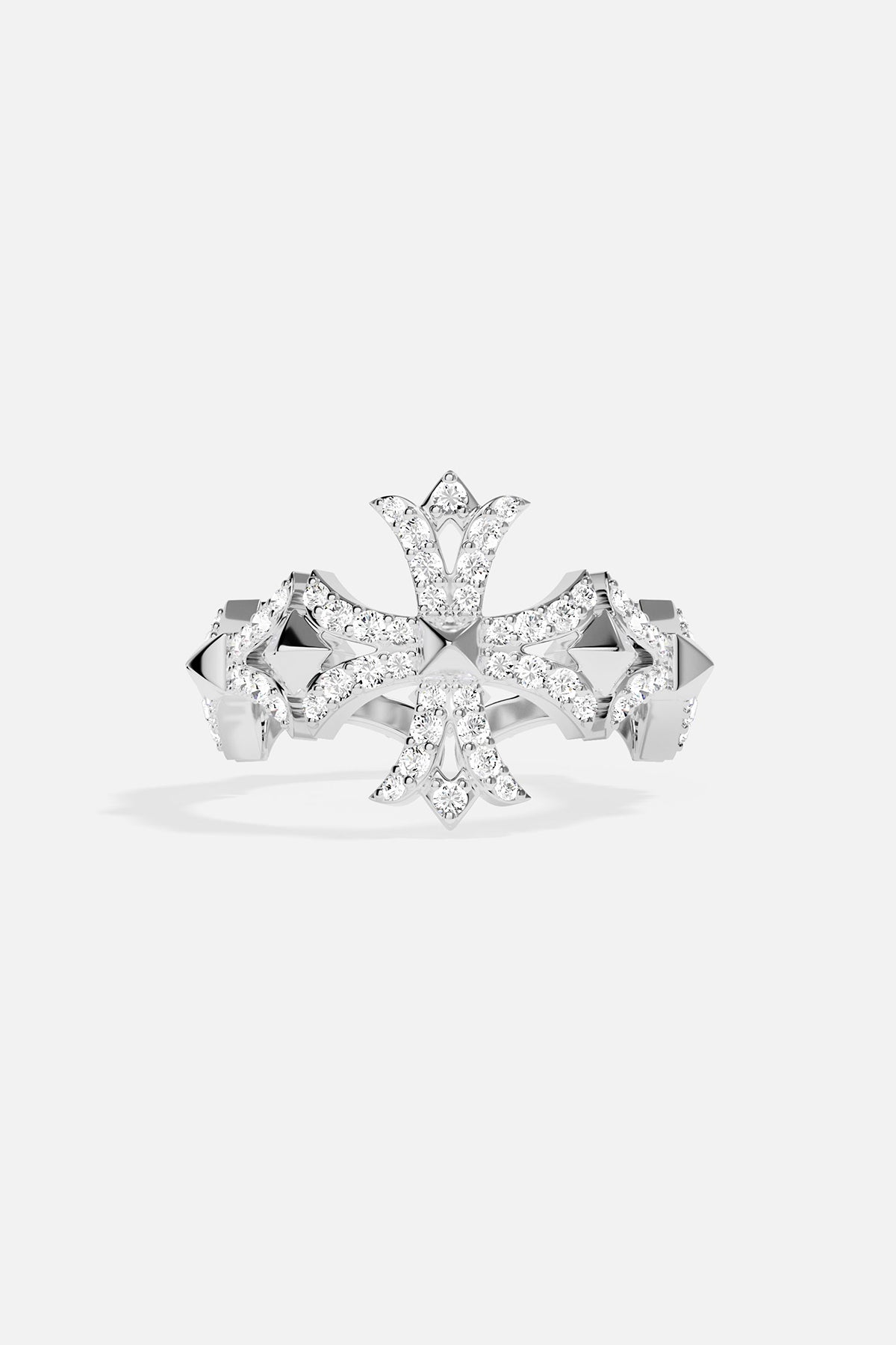 Ring with cross-shaped design on a light grey background
