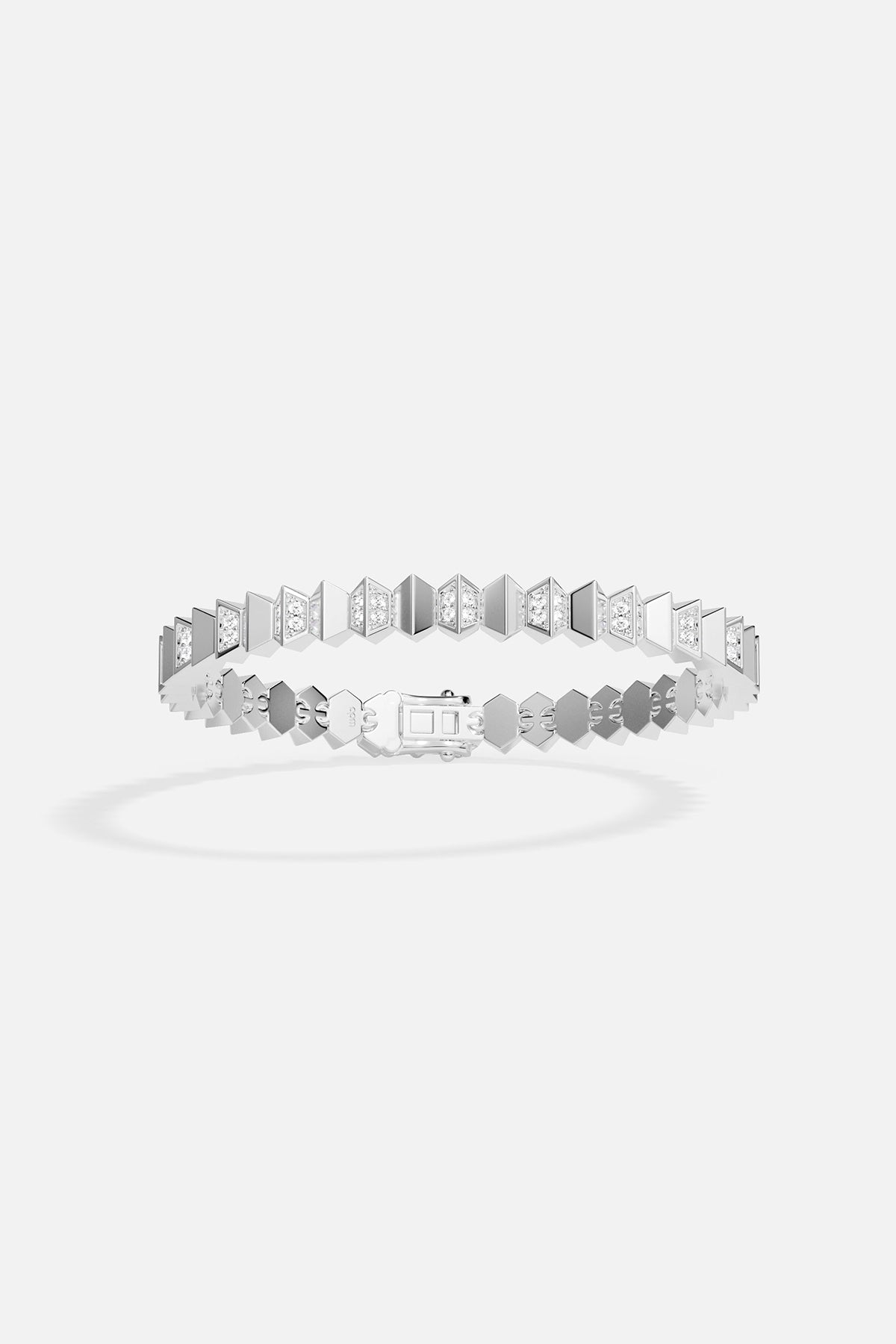 White bracelet with geometric design on a white background