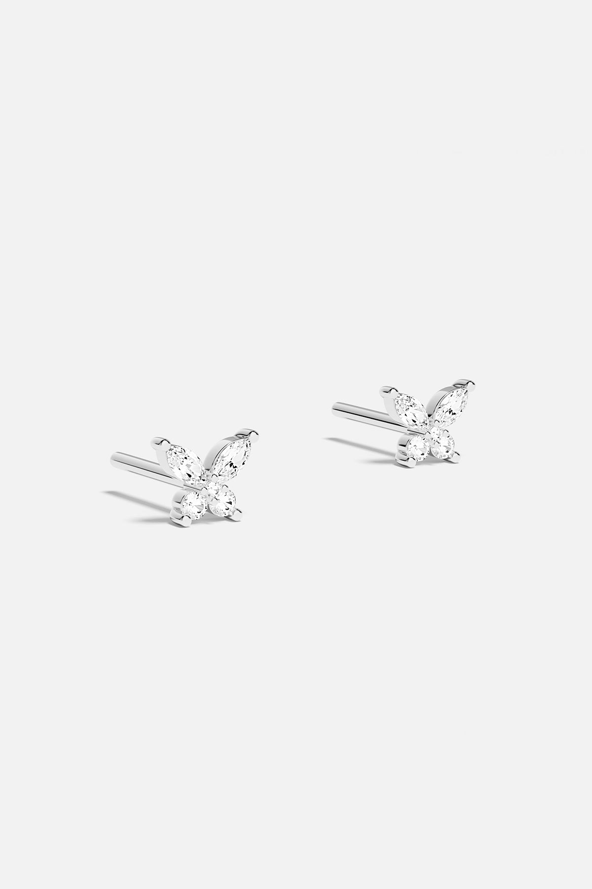 Earrings APM Monaco butterfly stud earrings with gem-encrusted wings.