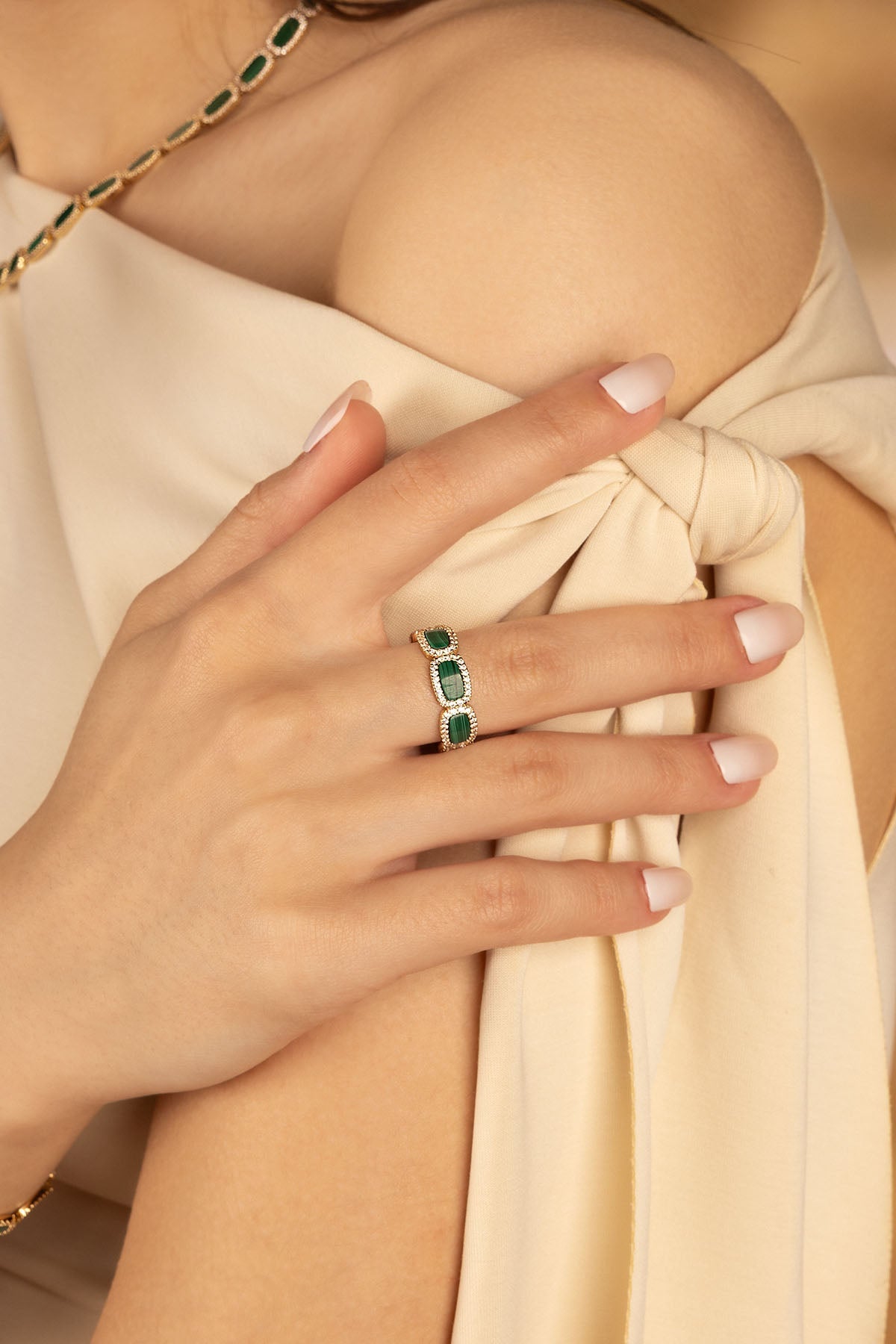 Rings, APM Monaco. Yellow Gold ring with Malachite stone.