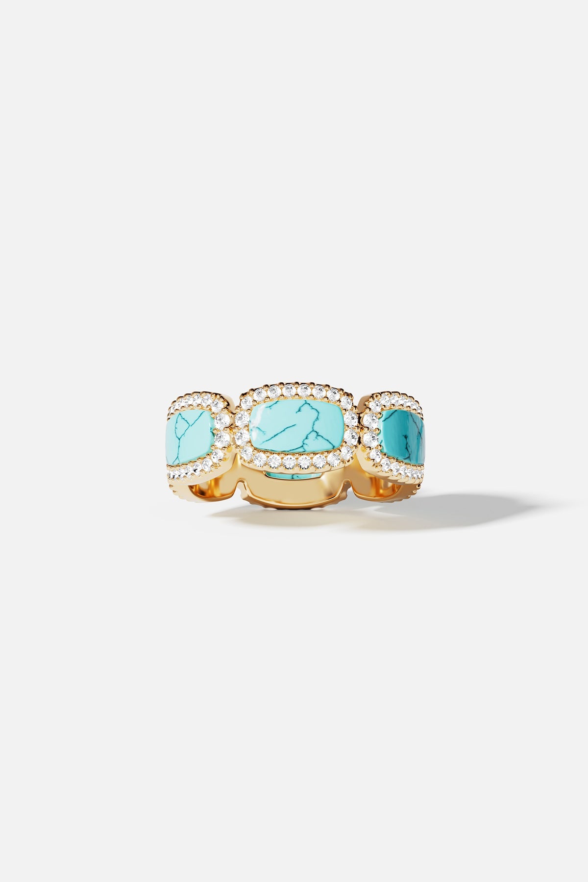 Ring, APM Monaco: yellow gold ring with three Lagoon turquoise stones, each surrounded by a halo of small white diamonds.