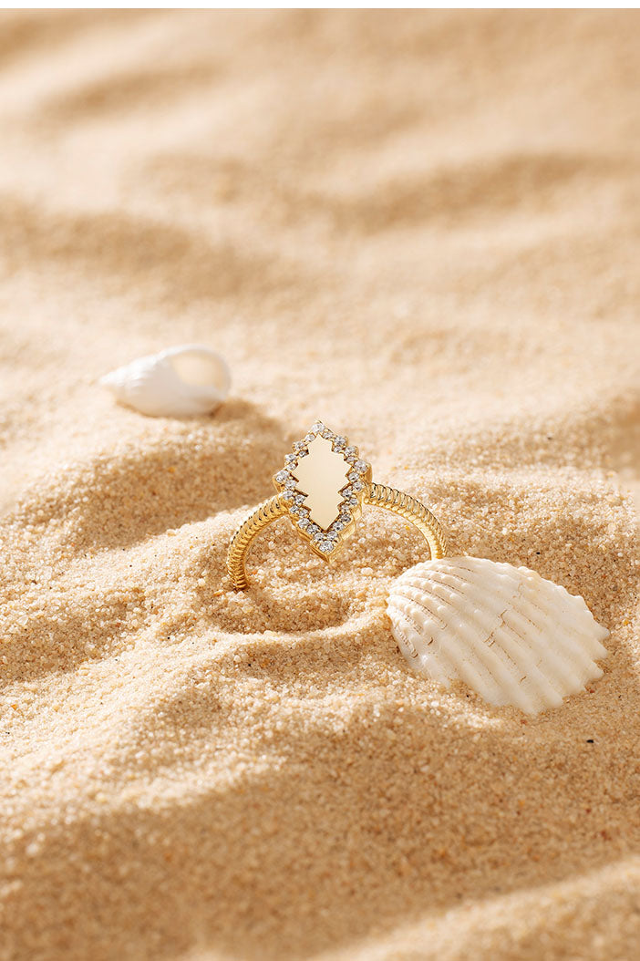 Rings APM Monaco: yellow gold ring with pavé white diamond border.