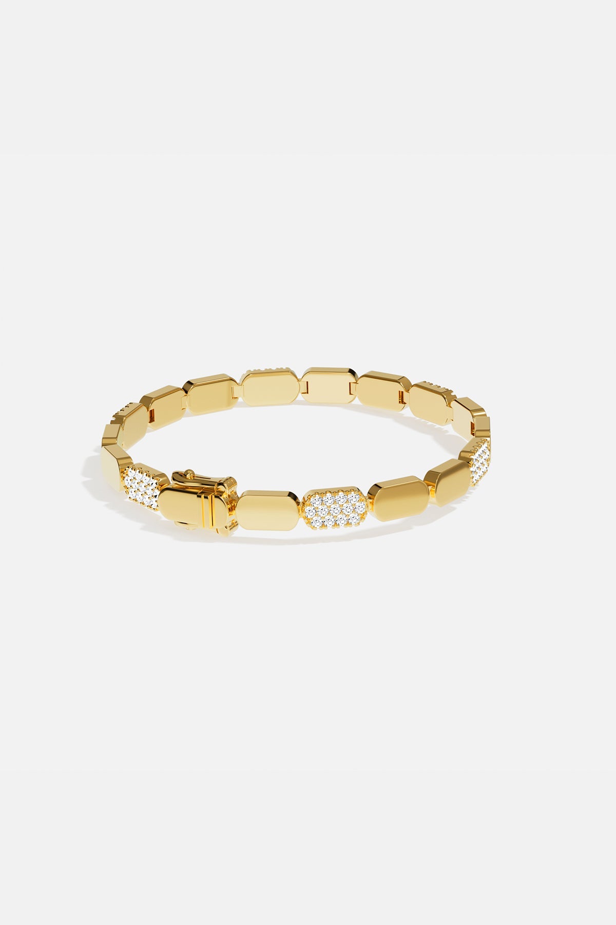 Bracelets APM Monaco: Yellow gold dainty bracelet with alternating plain and white cubic zirconia rectangular links.