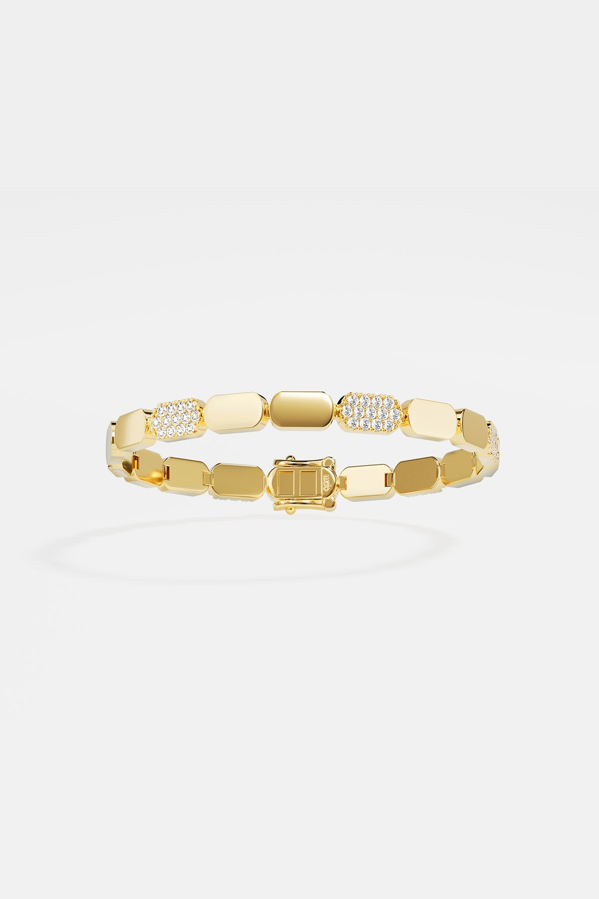 Bracelets APM Monaco: Yellow gold dainty bracelet with alternating plain and white cubic zirconia rectangular links.