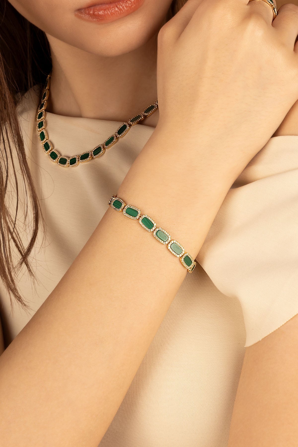 Bracelets APM Monaco. Yellow gold chain bracelet with green malachite stones.