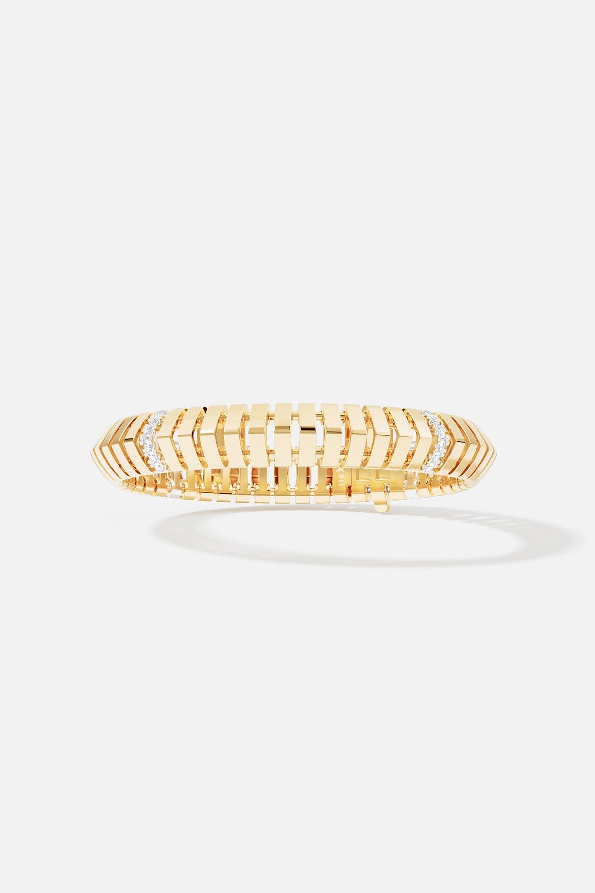 Bracelets APM Monaco, yellow gold-tone bracelet with rectangular links and pavé crystals.