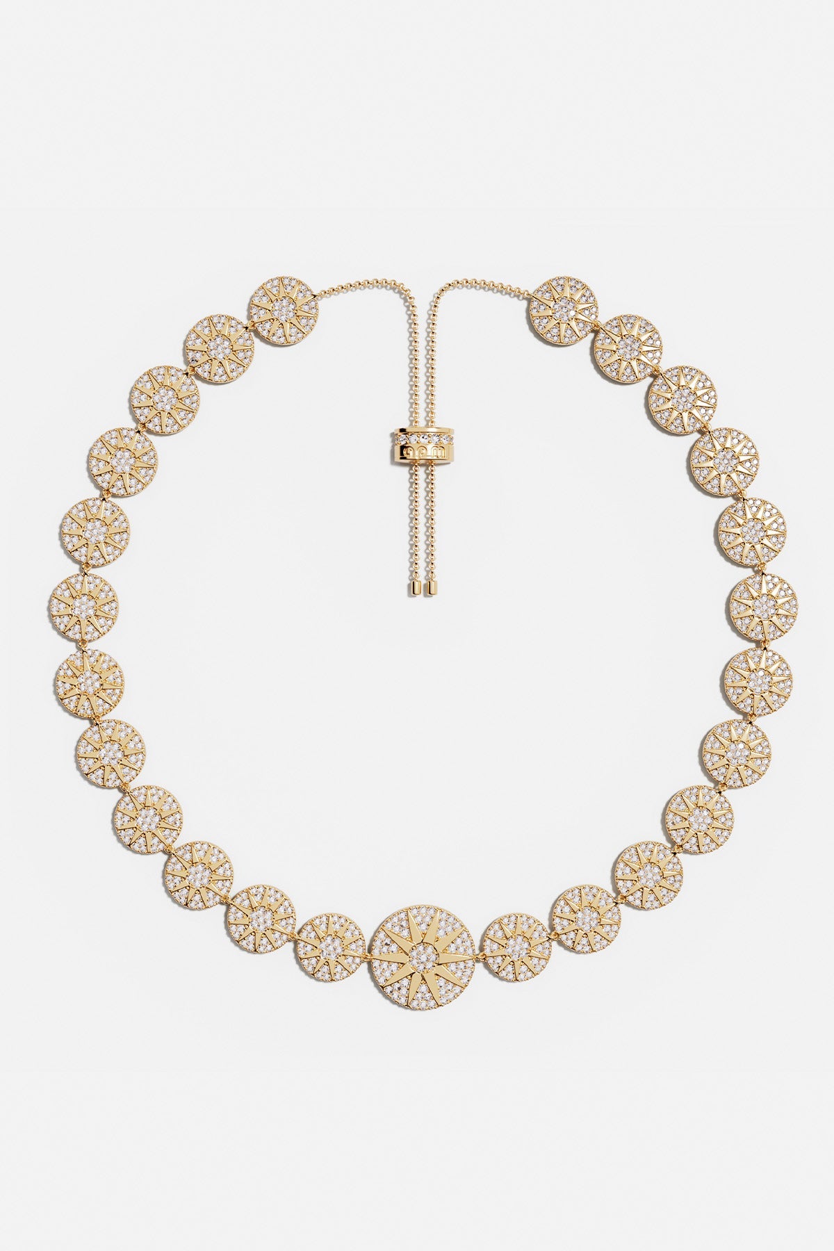 Necklaces APM Monaco yellow gold-tone adjustable necklace with pavé white stones arranged in circular motifs, featuring a larger central circle.
