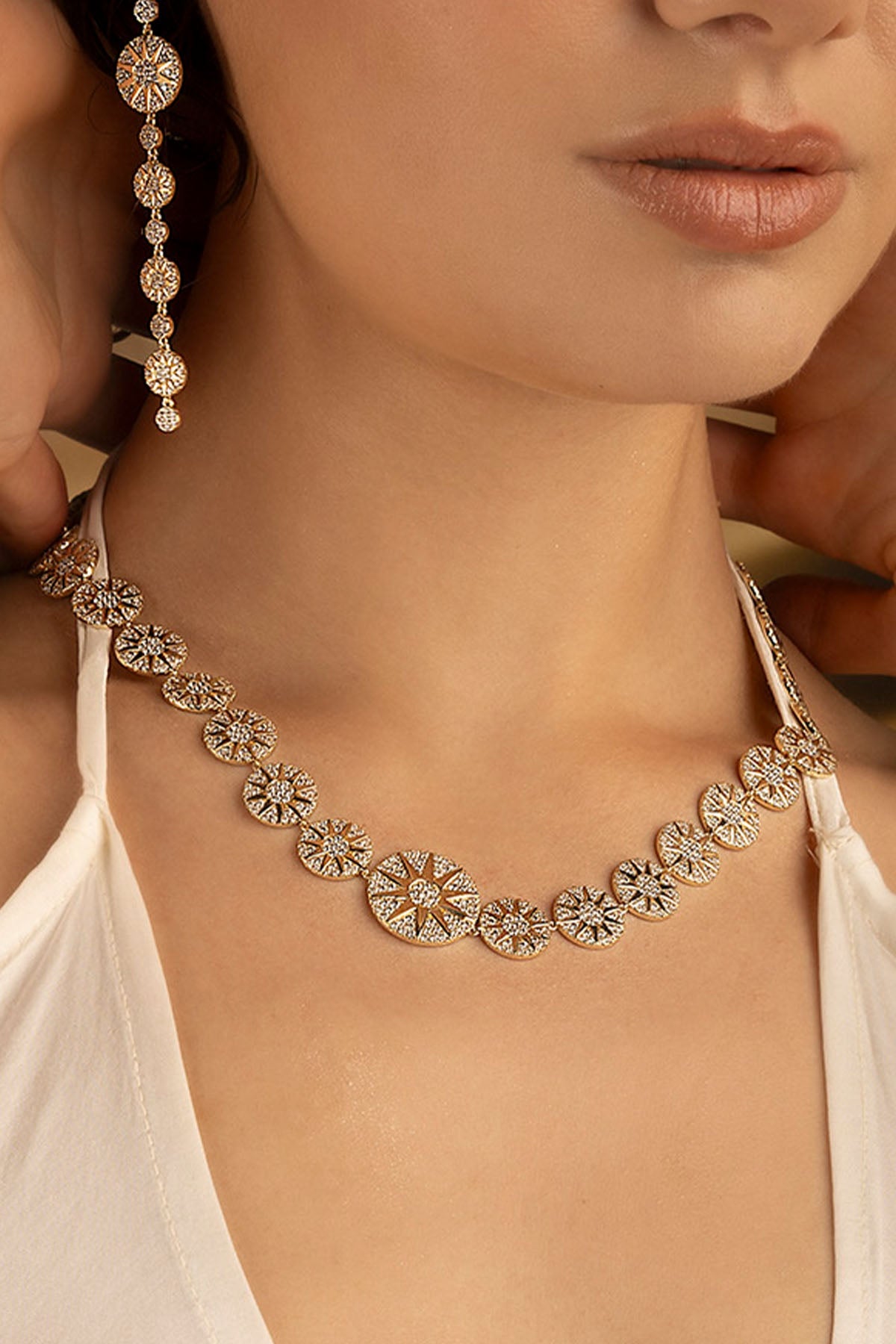 Necklaces APM Monaco adjustable Soleil necklace in gold-tone chain with sun-disc pendant.