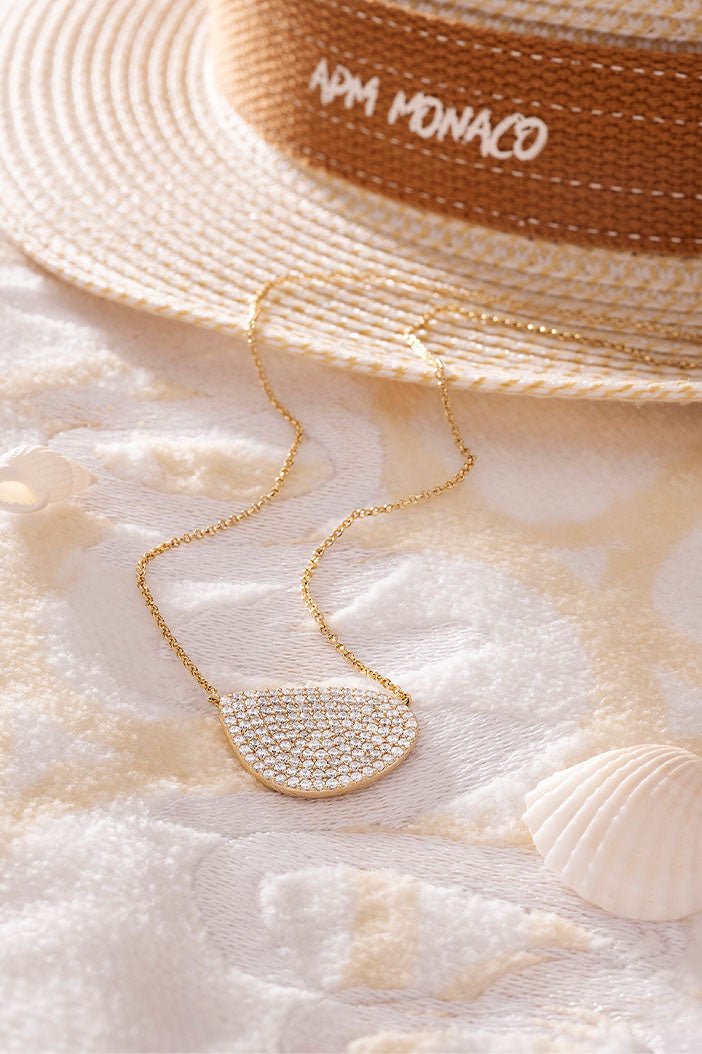 Necklaces APM Monaco adjustable pavé galet necklace in yellow gold with pavé crystals.