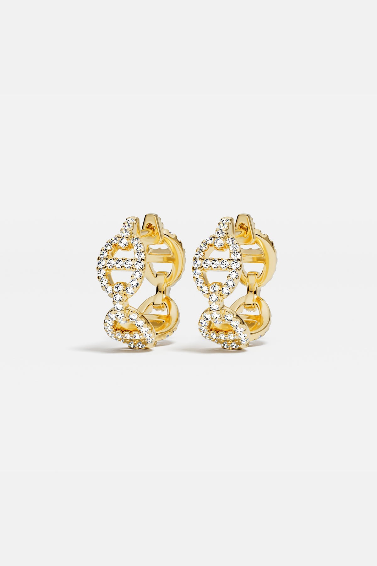 Earrings APM Monaco yellow gold maille marine hoop with white cubic zirconia.