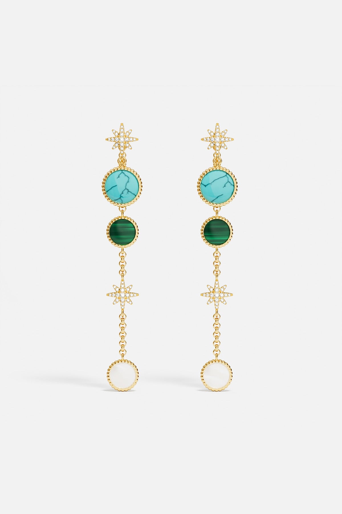 Earrings APM Monaco ear jackets in yellow gold with turquoise, green, and white stones with stars.