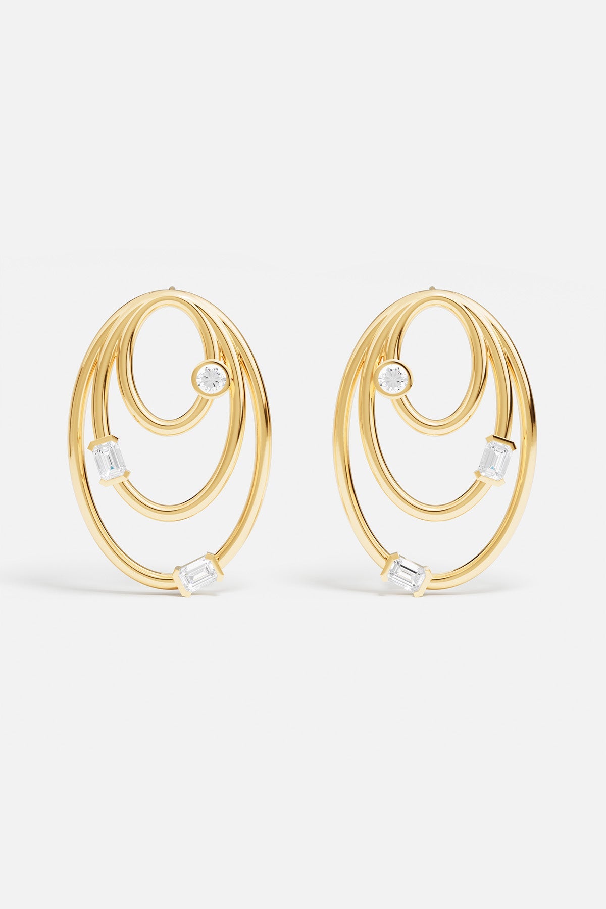 Earrings APM Monaco: yellow gold oval earrings with pavé diamonds.