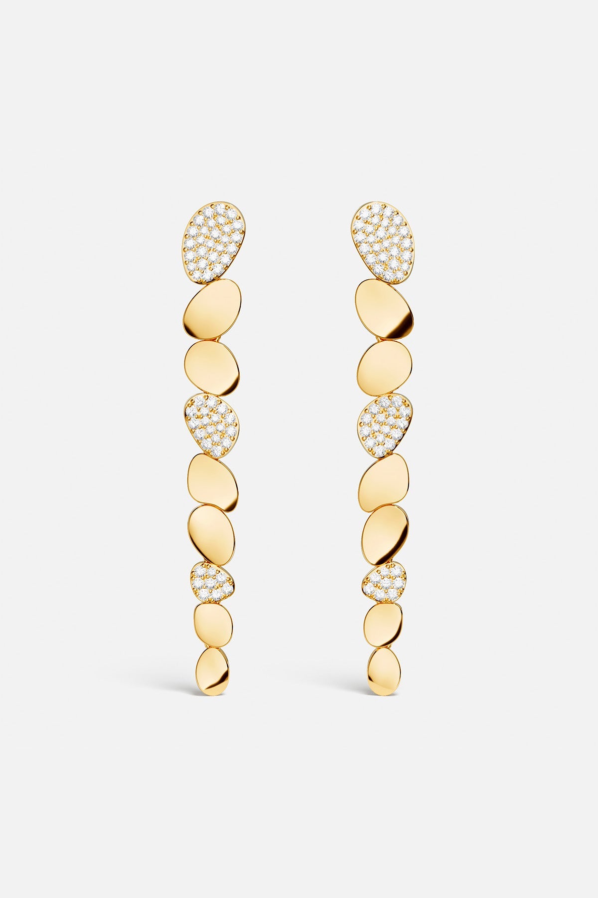 Earrings APM Monaco, yellow gold drop earrings with connected flat stones (pavé diamonds) forming a cascading design.