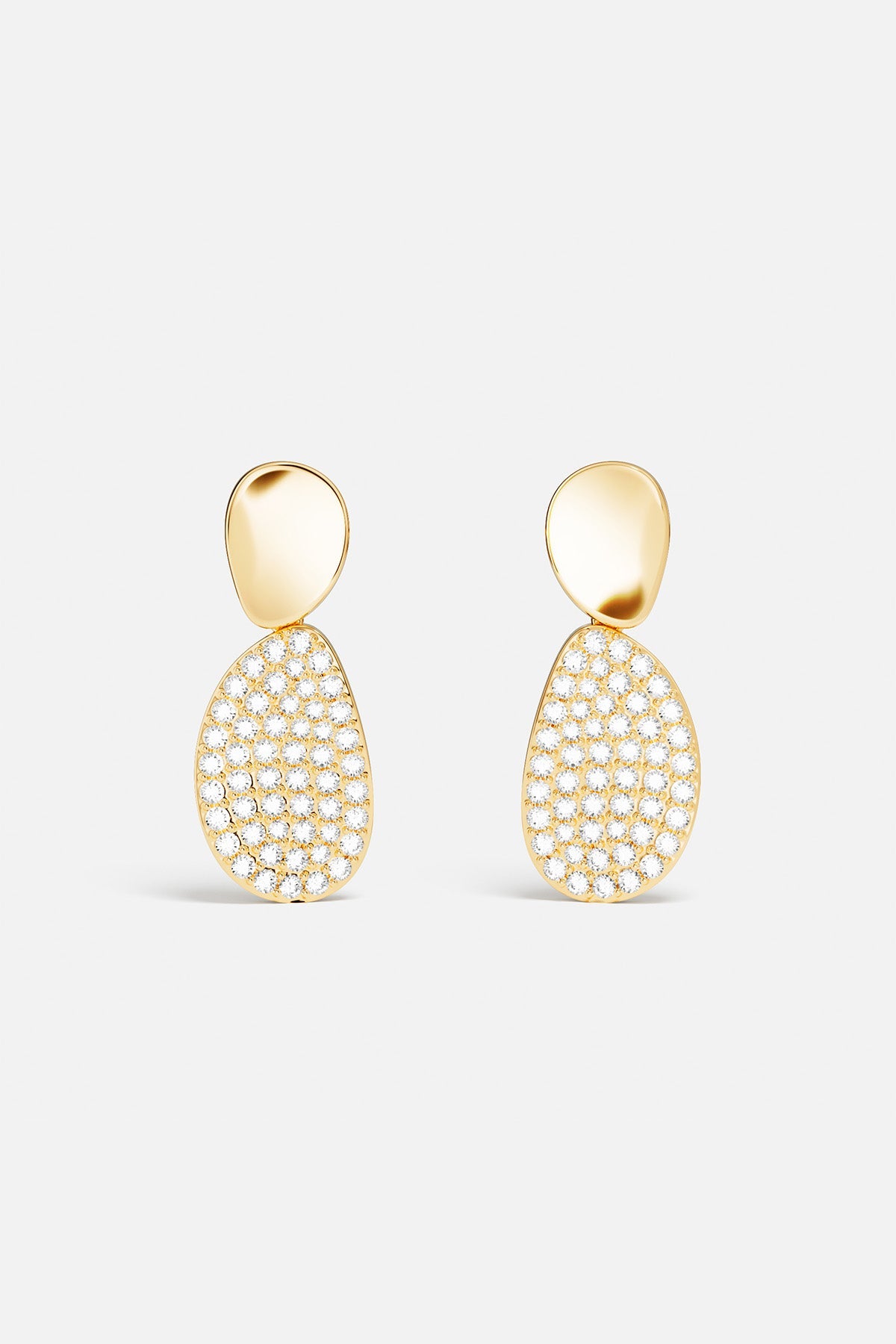 Earrings APM Monaco, two teardrop-shaped yellow gold earrings with white gems.