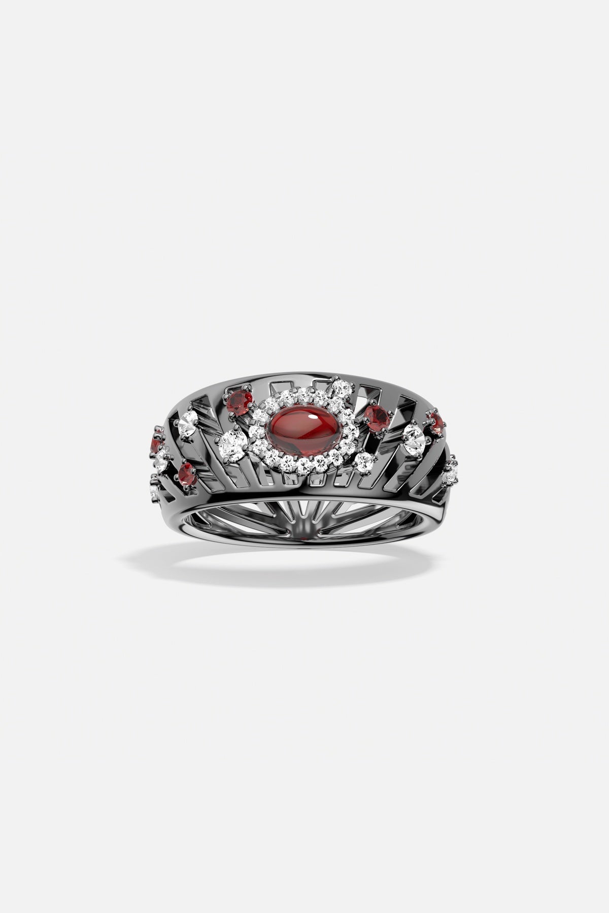 APM Ring in dark rhodium finish, a bold gaze of crimson allure.
