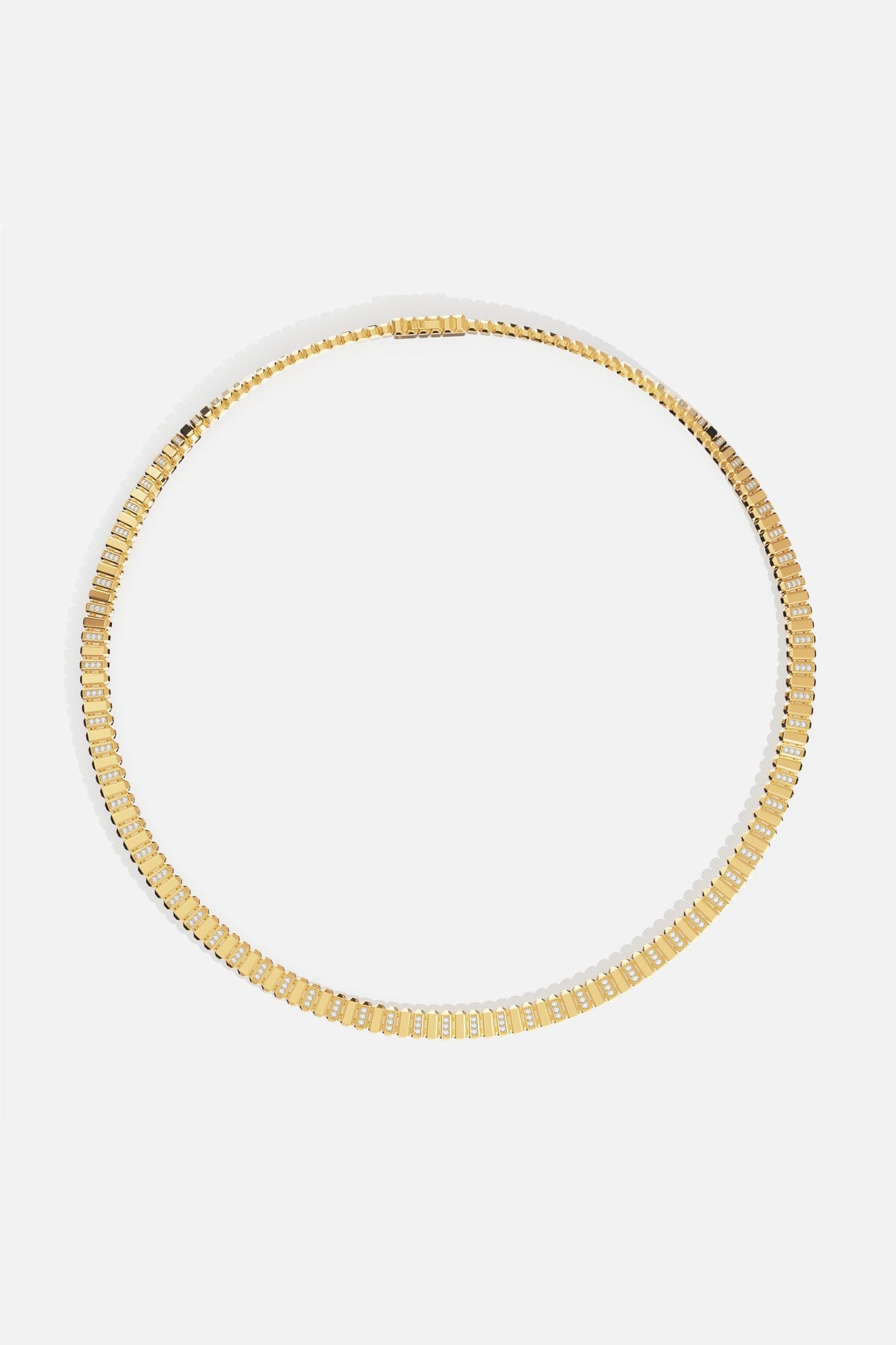 APM Necklace in golden color, a radiant line of quiet confidence.